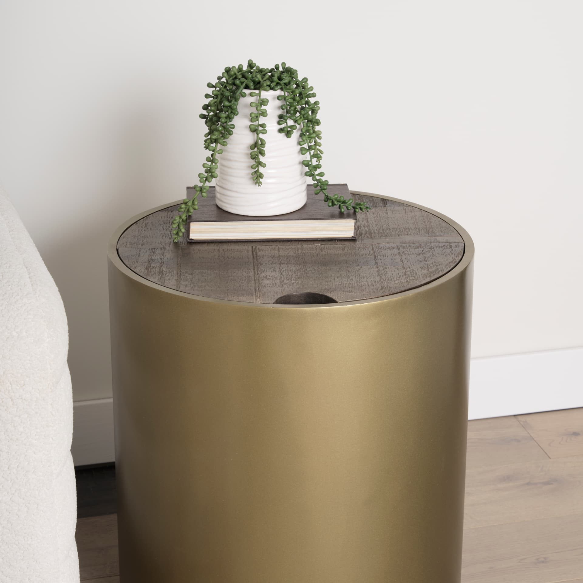 Eclipse Antique Brass Metal Drum Base w/ Dark Brown Wood Top End/Side Table — in a styled room