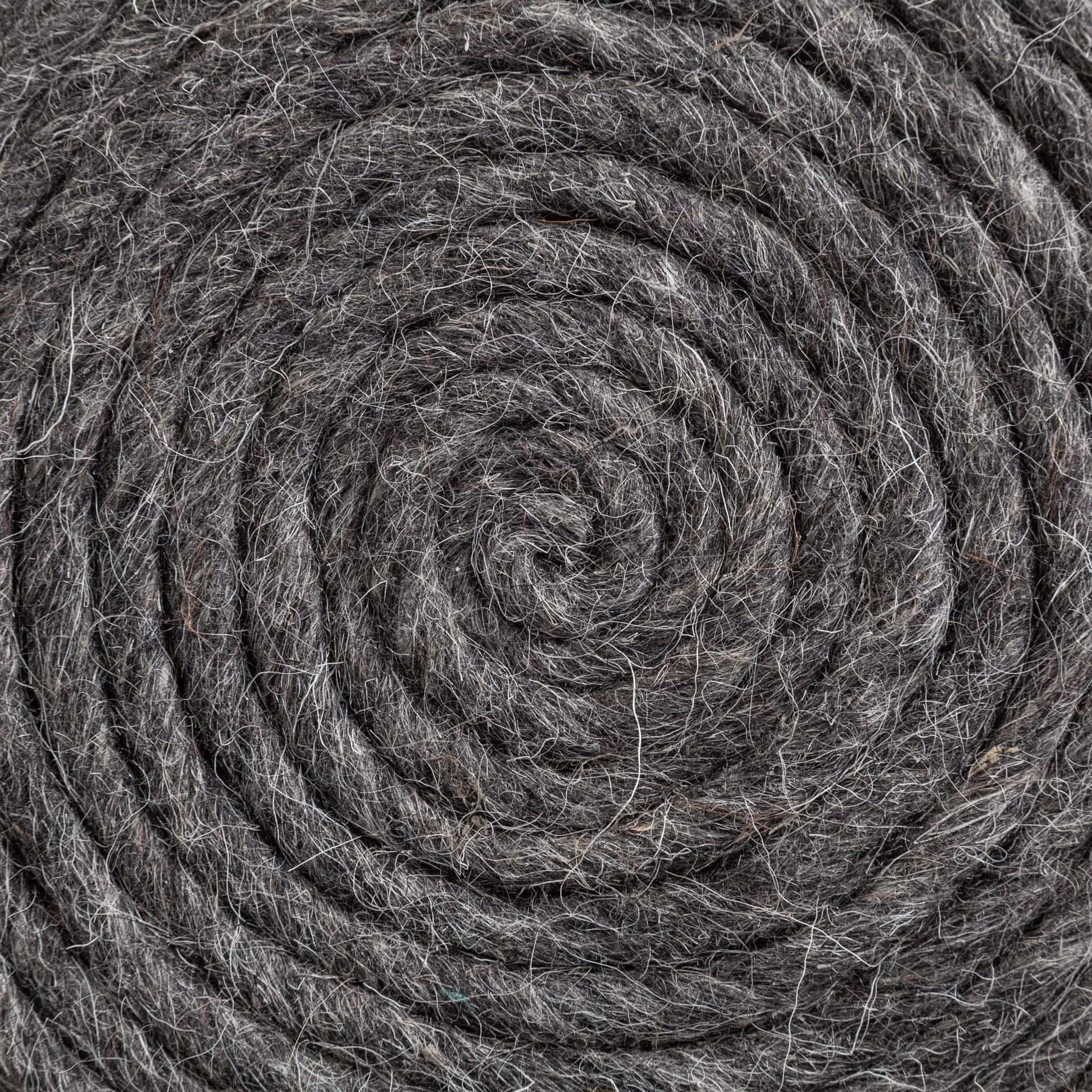 Allium Dark Gray Handwoven Wool Cylindrical Pouf — product photograph
