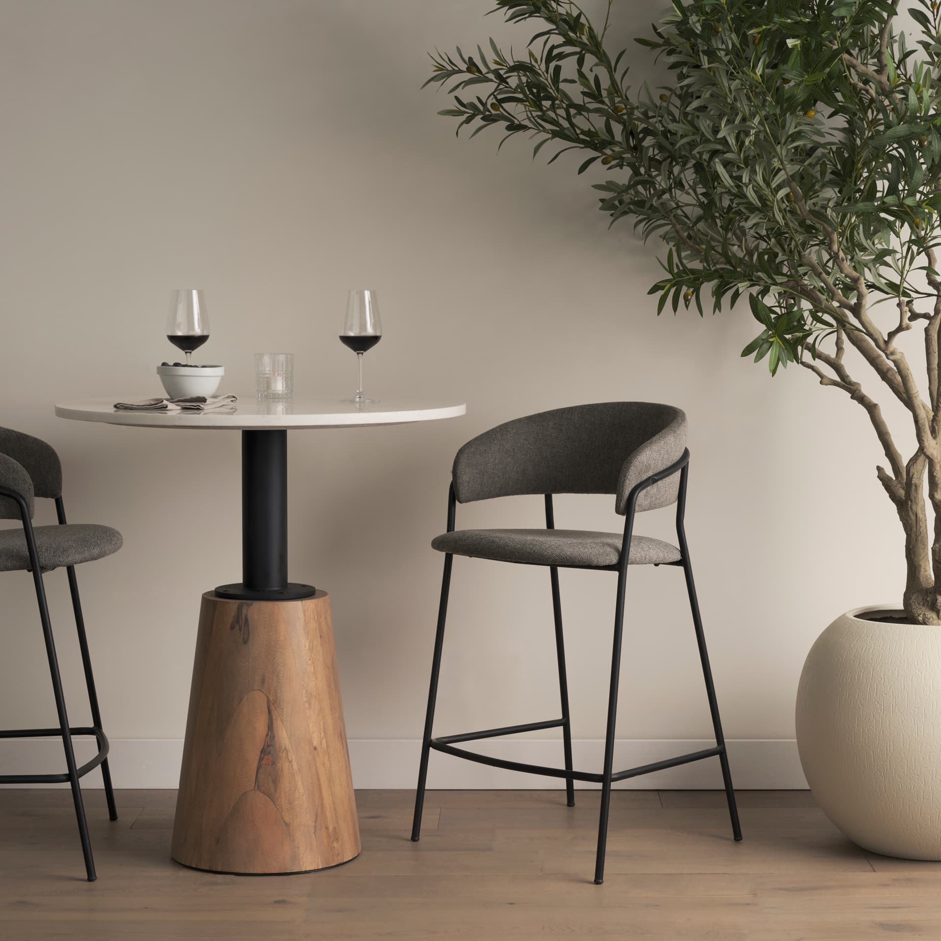 Carolyn Low Back 25.9in Seat Counter Stool | Gray Fabric — in a styled room