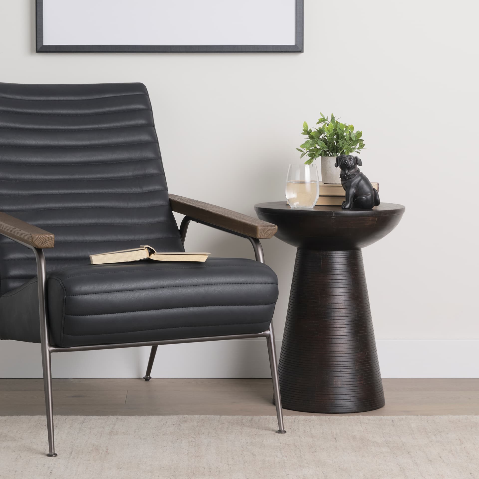 Cadence 4L x 5W Black Resin Pug Dog — in a styled room