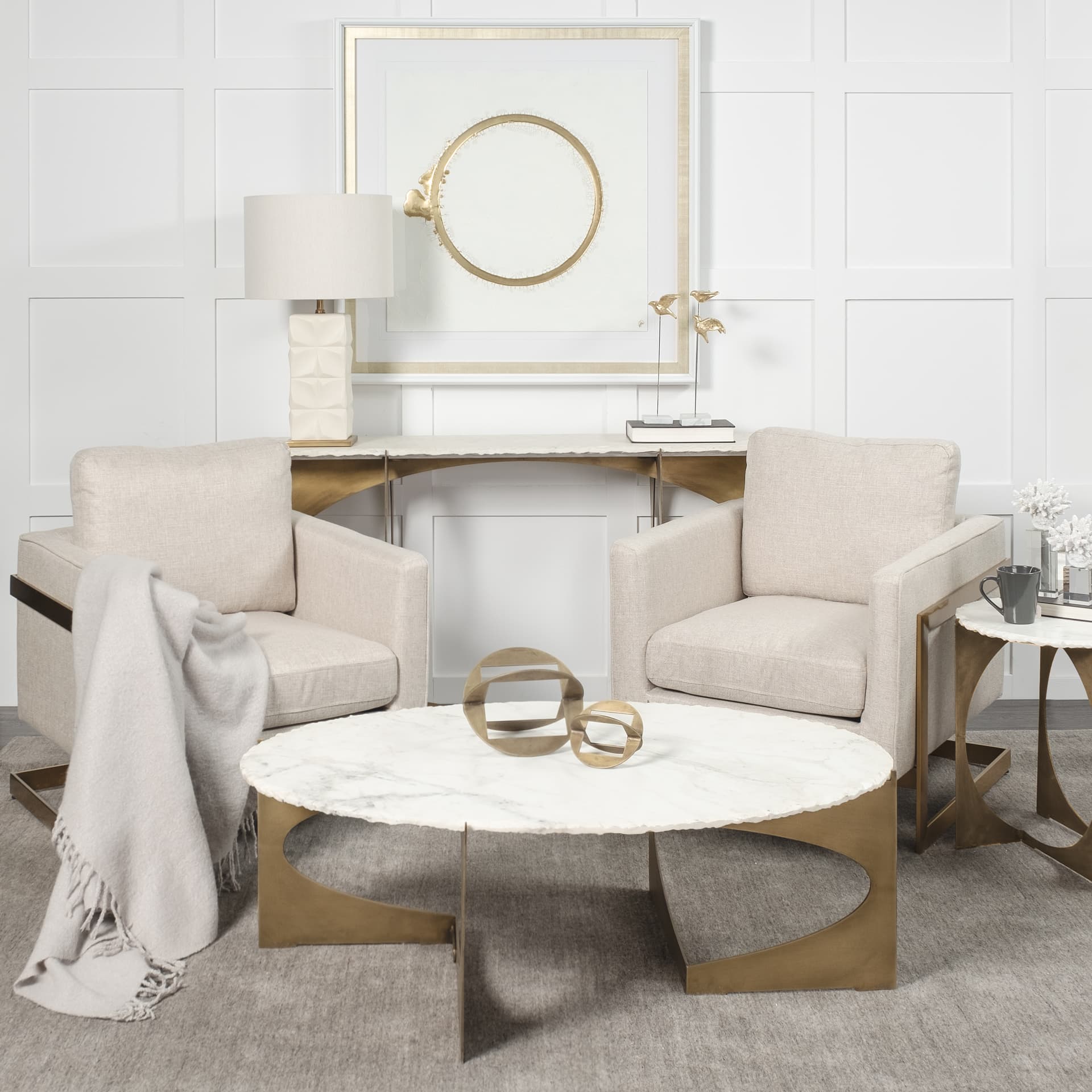 Reinhold IV 59L x 16W White Marble Top Gold Metal Base Console Table — in a styled room