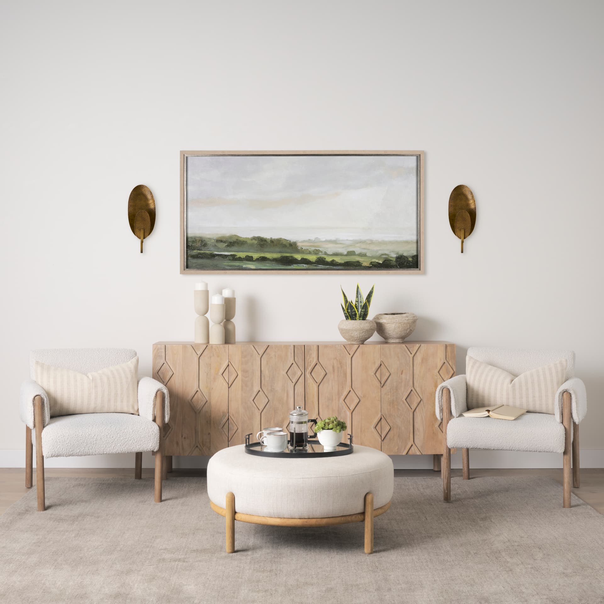 Clarence 7.0L x 5.3W x 17.0H Metal Hammered Gold Round Wall Sconce — in a styled room