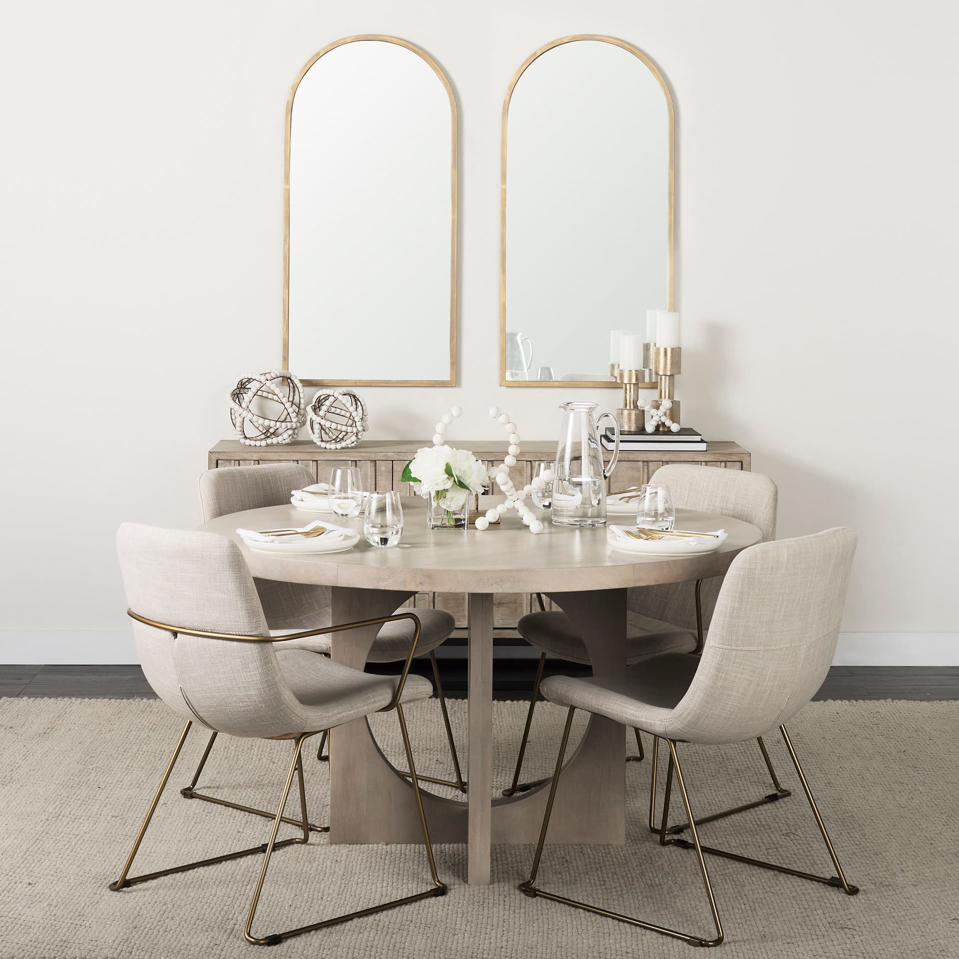 Giovanna 23.6L x 1.2W x 48.8H Gold Metal Frame Rounded Arch Vanity Mirror — in a styled room