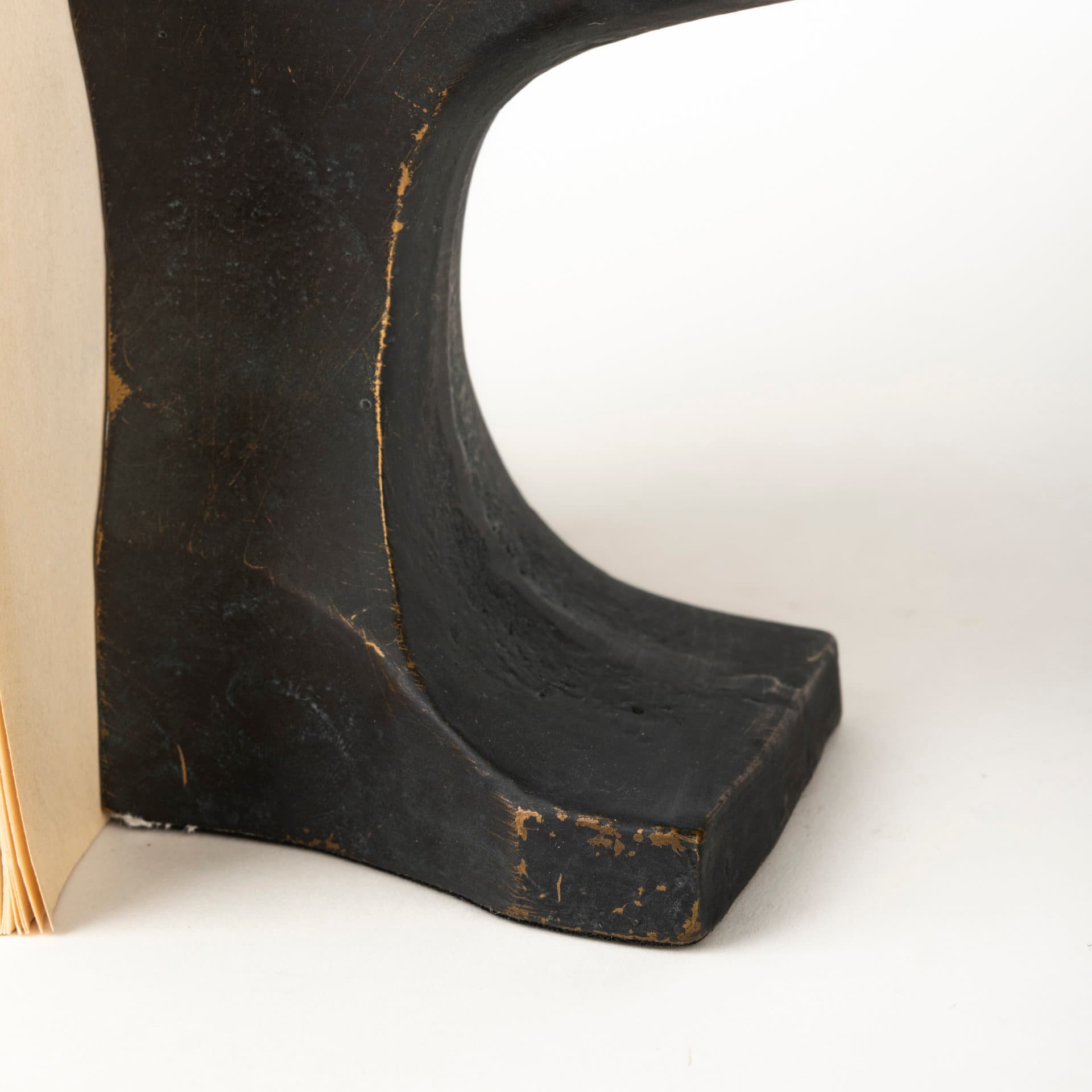 Anvilia (Set of 2) 12L x 4W Black With Gold Accents Anvil Shaped Bookends — product photograph