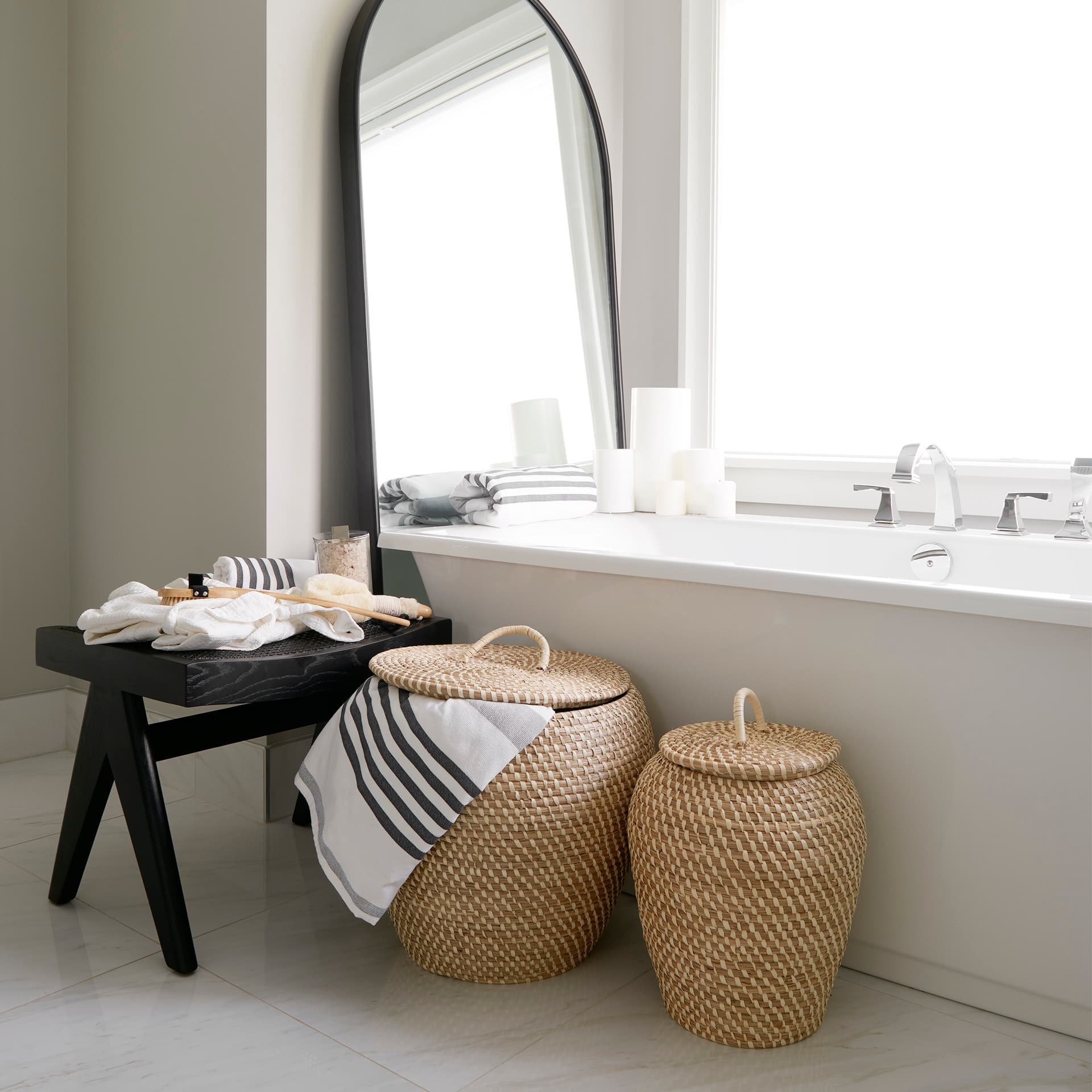 Arvin 21.7L x 17.7W x 18.1H Black Wooden Stool — in a styled room