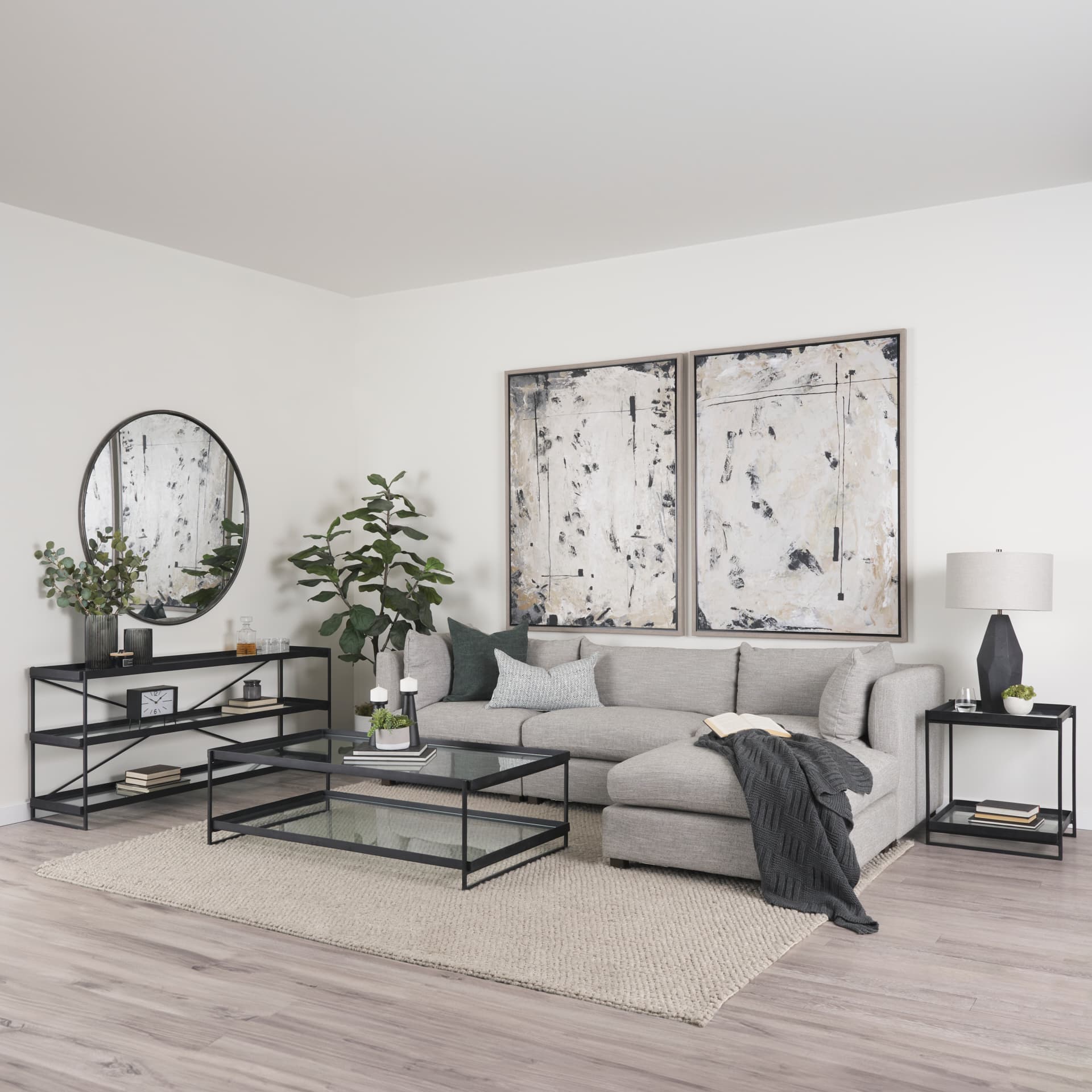 Trey Black Metal W/Glass Accent Table — in a styled room