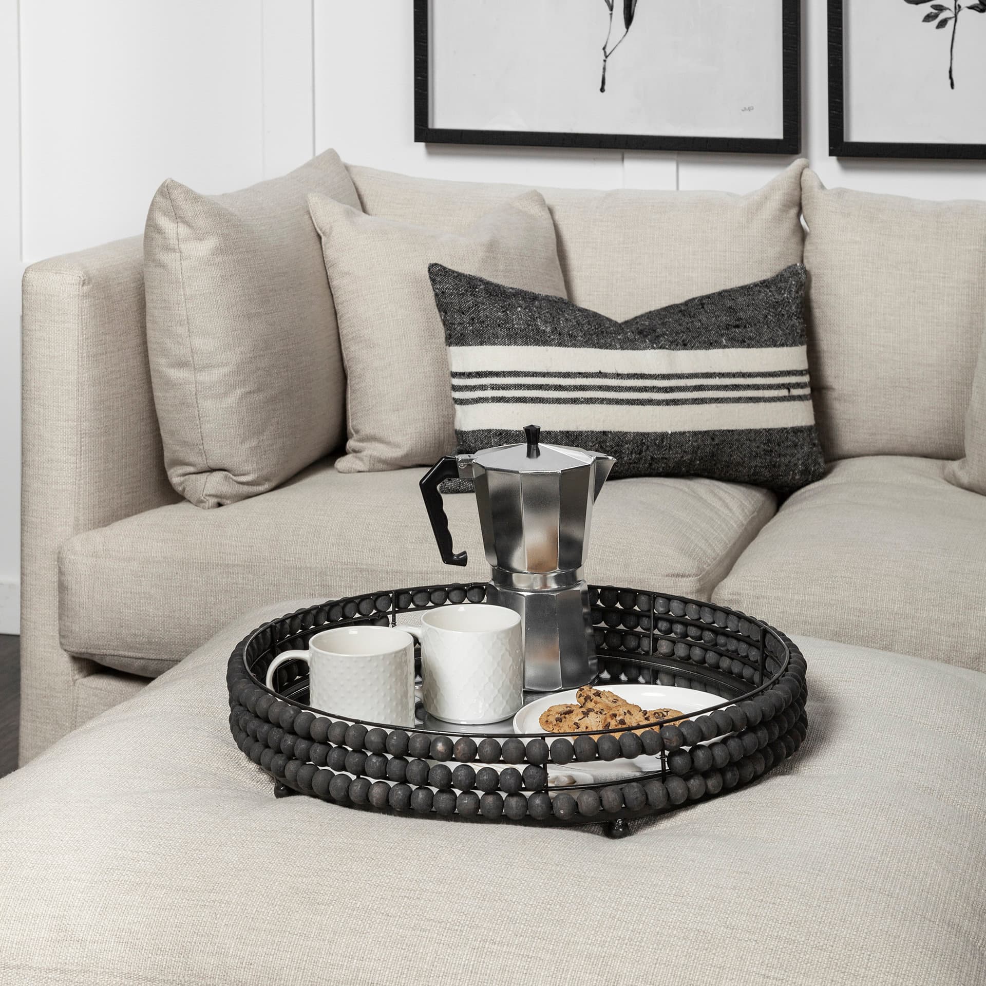 Decatur II 21L x 21W Black Wooden Bead Mirrored Bottom Round Tray — in a styled room