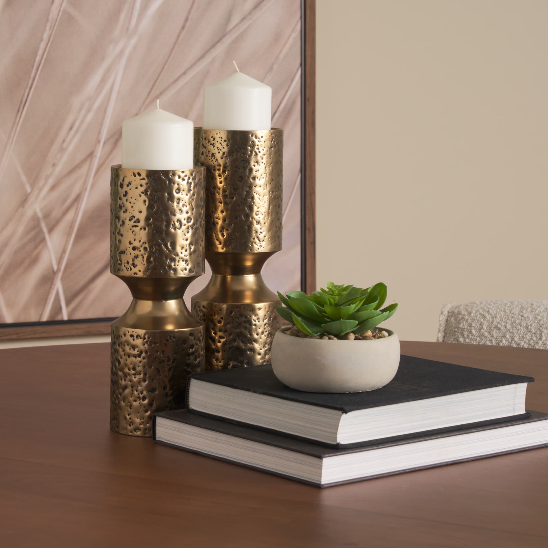 Akira Large Hammered Gold Metal Pillar Candle Holder — in a styled room