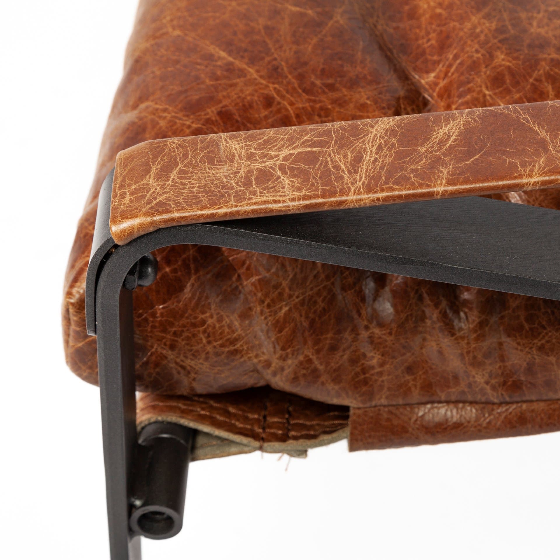 Hornet I 27.0L x 35.0W x 36.0H Brown Leather Unibody Seat w/ Black Metal Frame Accent Chair — product photograph