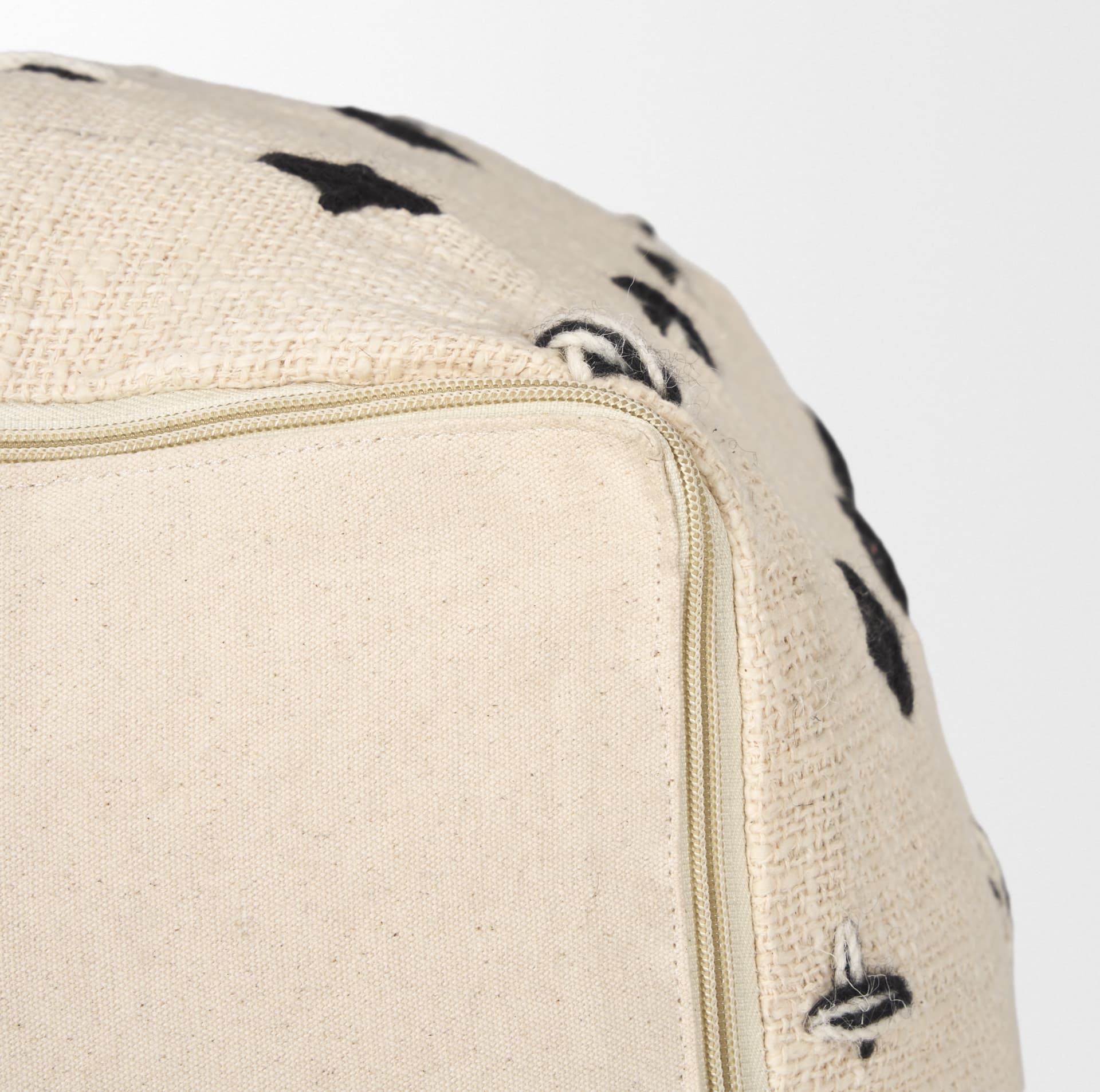Saanvi Wool w/ Cream and Black Stitched Cross Patterned Pouf — product photograph