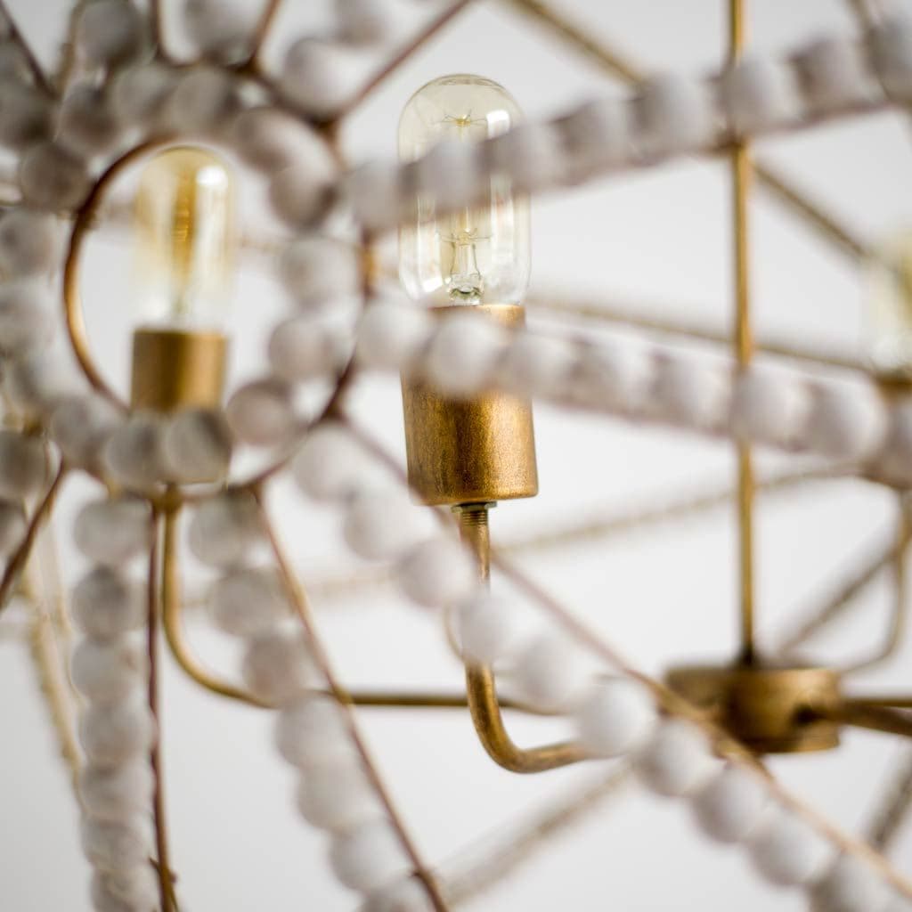 Ava White (34"D) Gold Metal and White Wood Beaded Six Bulb Chandelier — product photograph