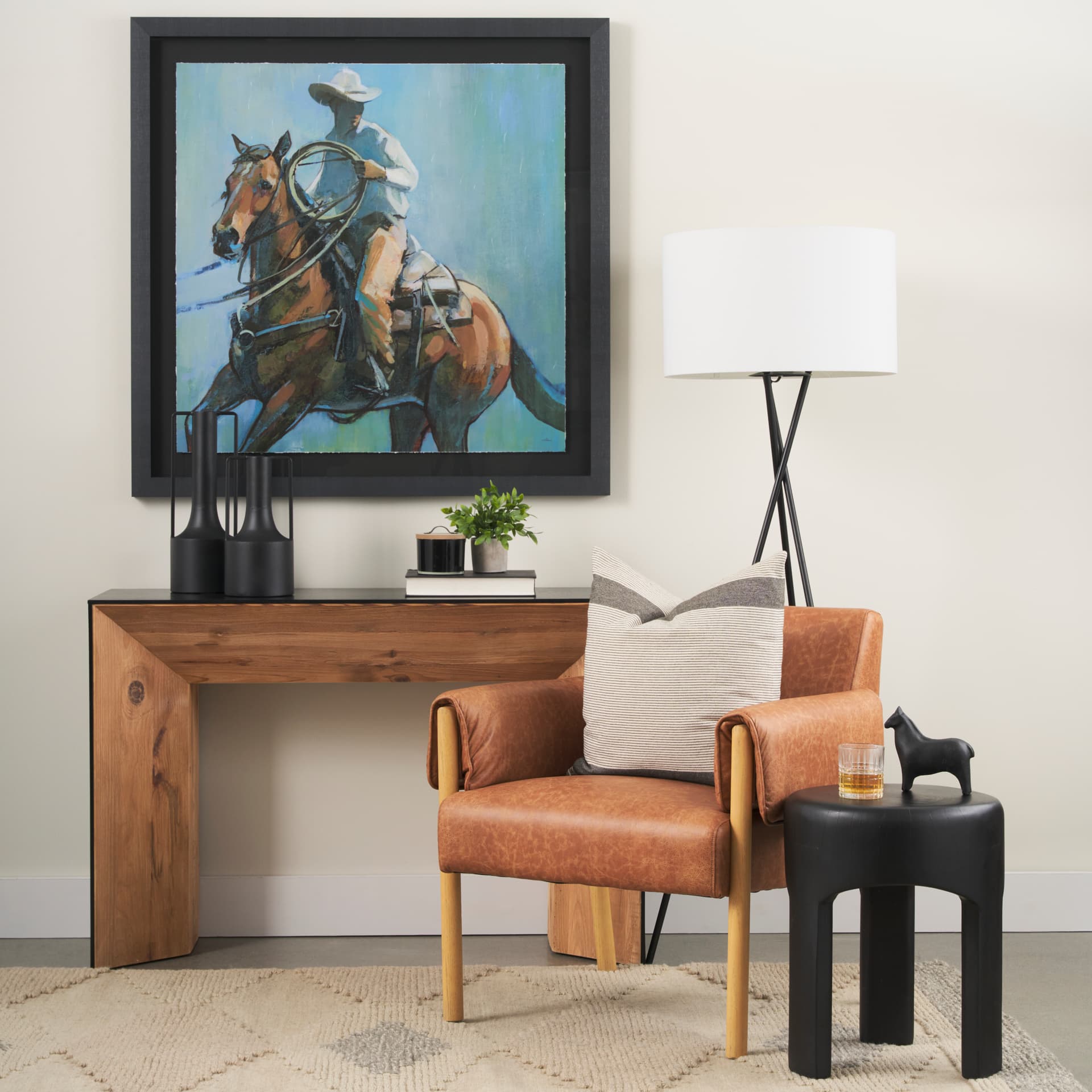 Riya Solid Black Wooden Stool — in a styled room