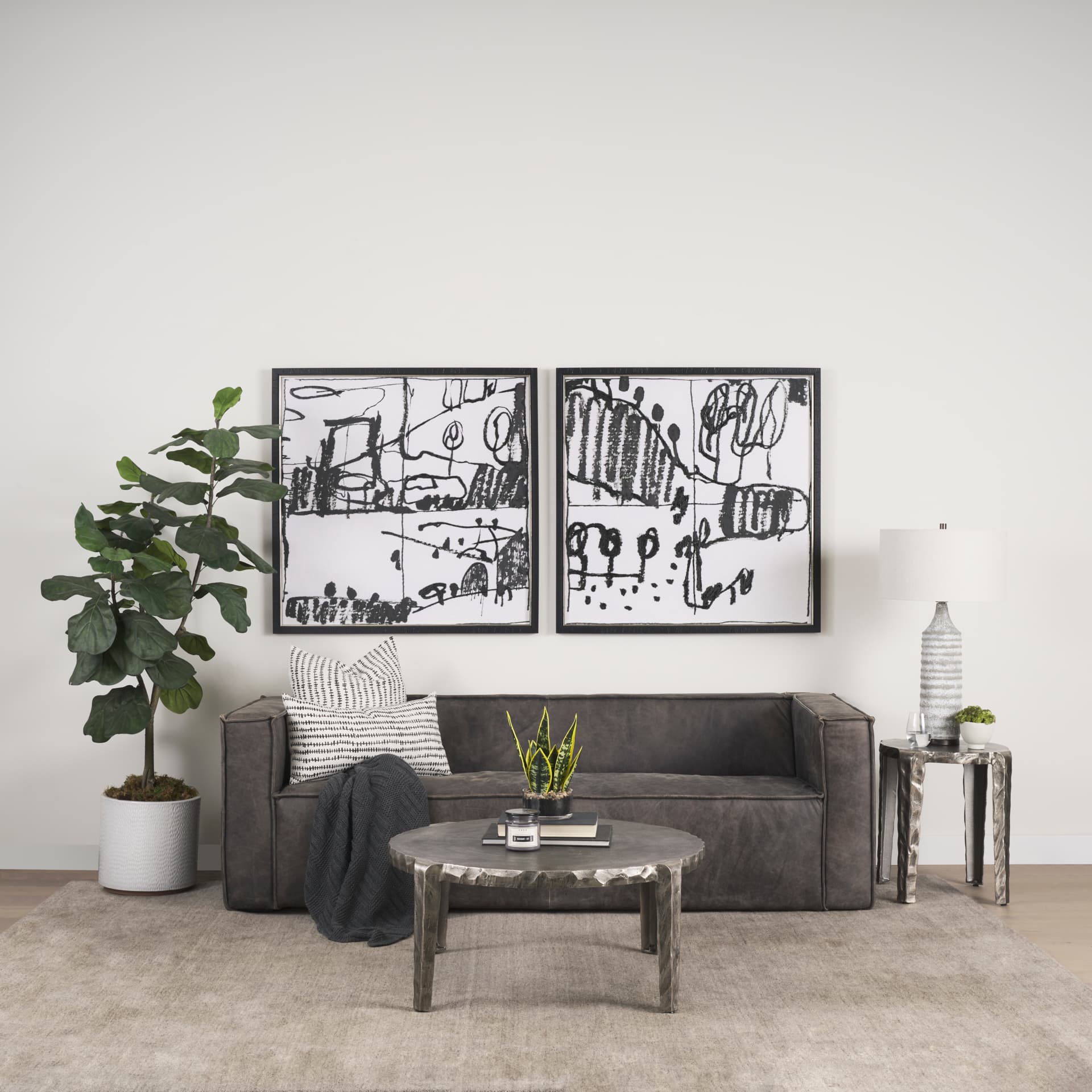 Randy Textured Silver Nickel Cast Aluminum Metal Accent Table — in a styled room