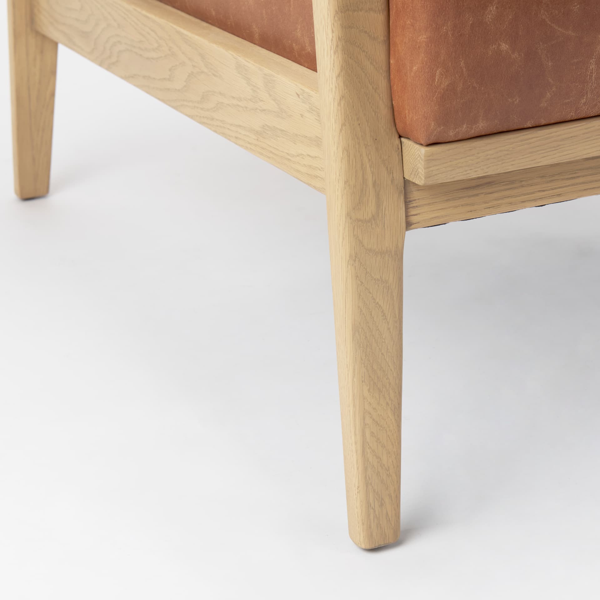 Raeleigh Tan Faux Leather Accent Chair — product photograph
