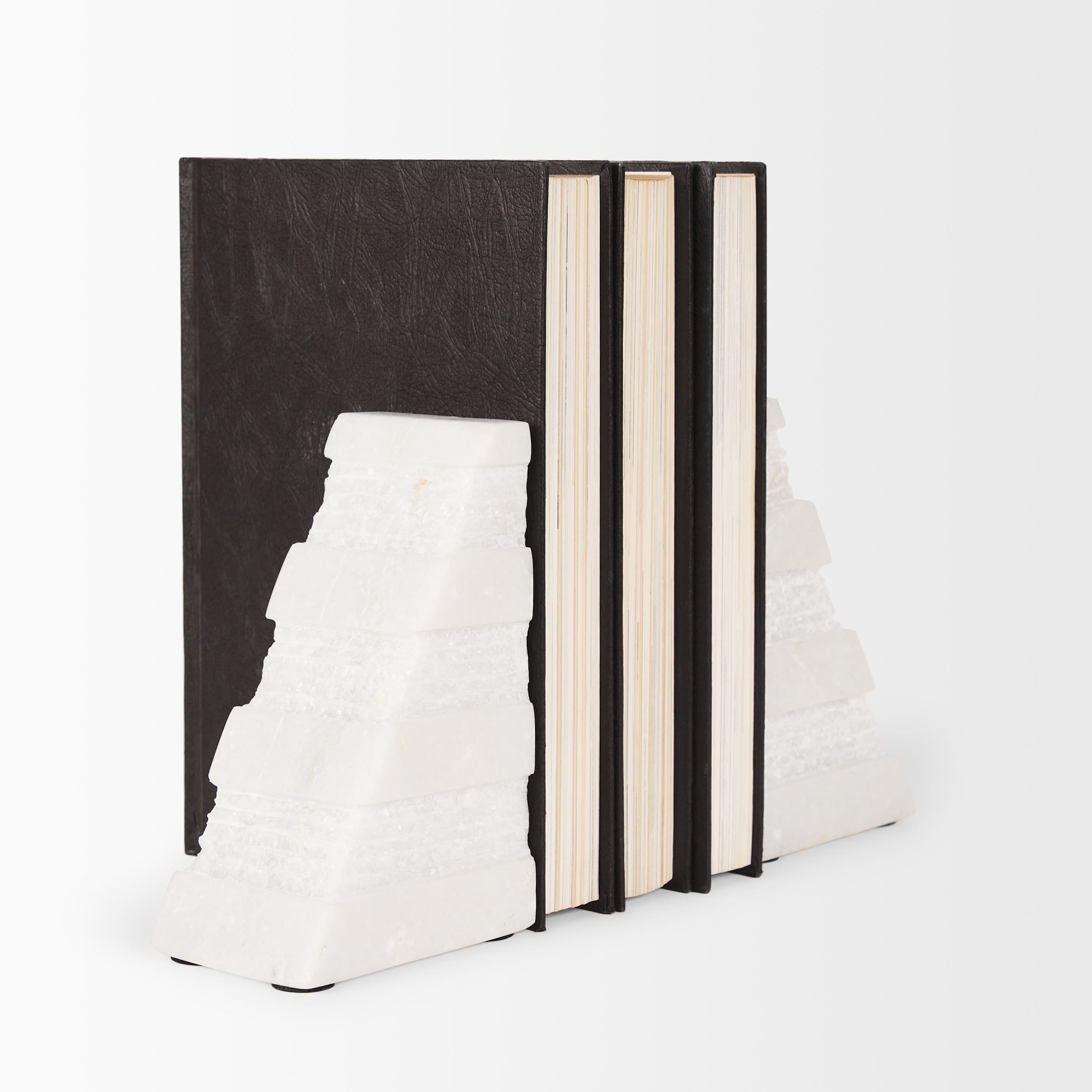 Cavetto White Marble Bookends w/rough carving S/2 — product photograph