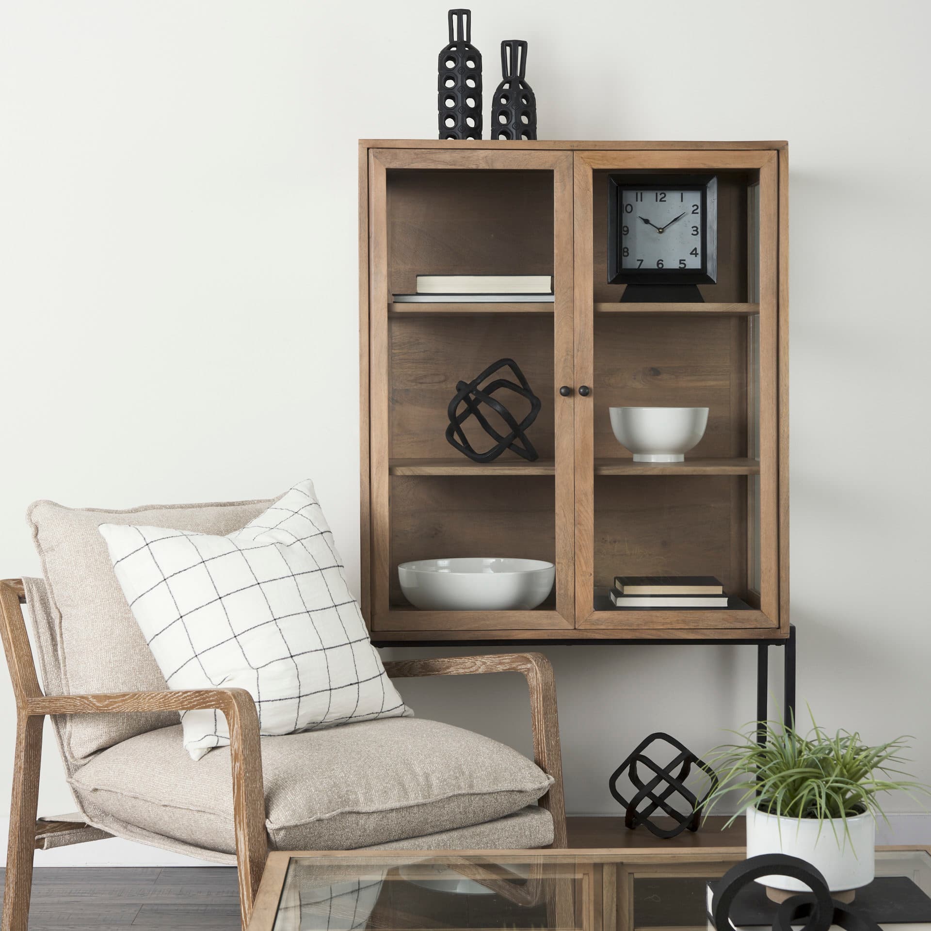 Arelius 36L x 18.75W x 63H Light Brown Wood W/ Black Metal Base Display Cabinet — product photograph
