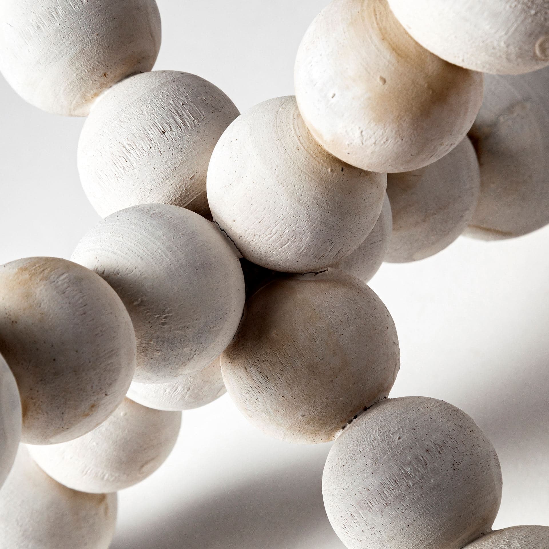 Carrollton I (Small) 7L x 7W Off-White Geometric Wood Ball Jack — product photograph