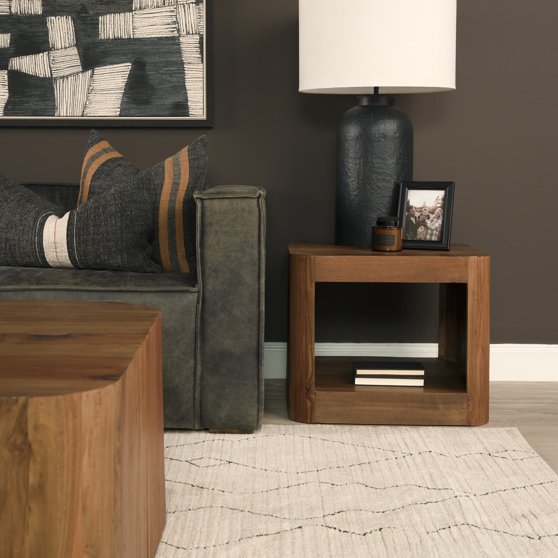 Dunmore Solid Wood Rectangular Open Shelf Side Table — in a styled room