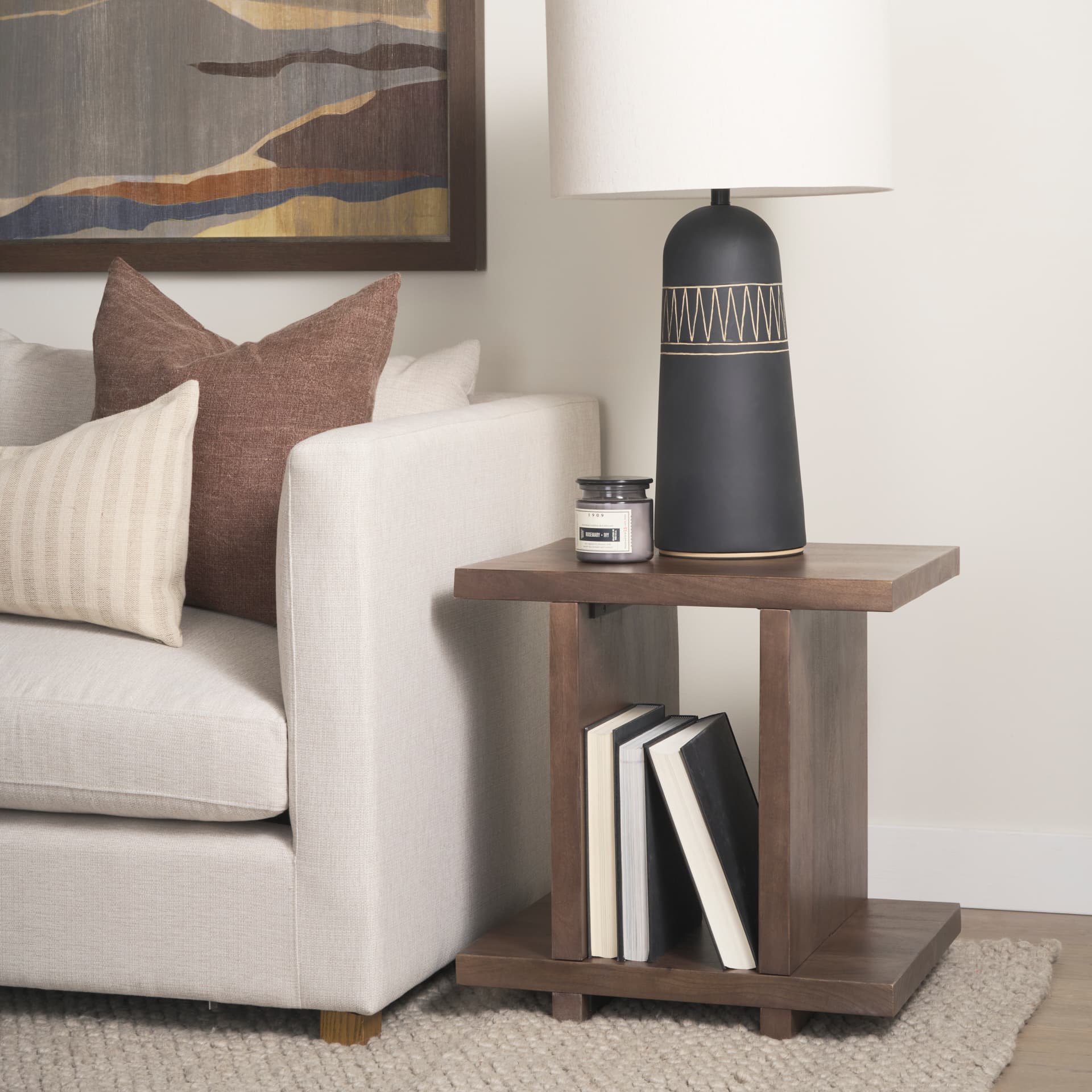 Nohr Medium Brown Wood Accent Table — in a styled room