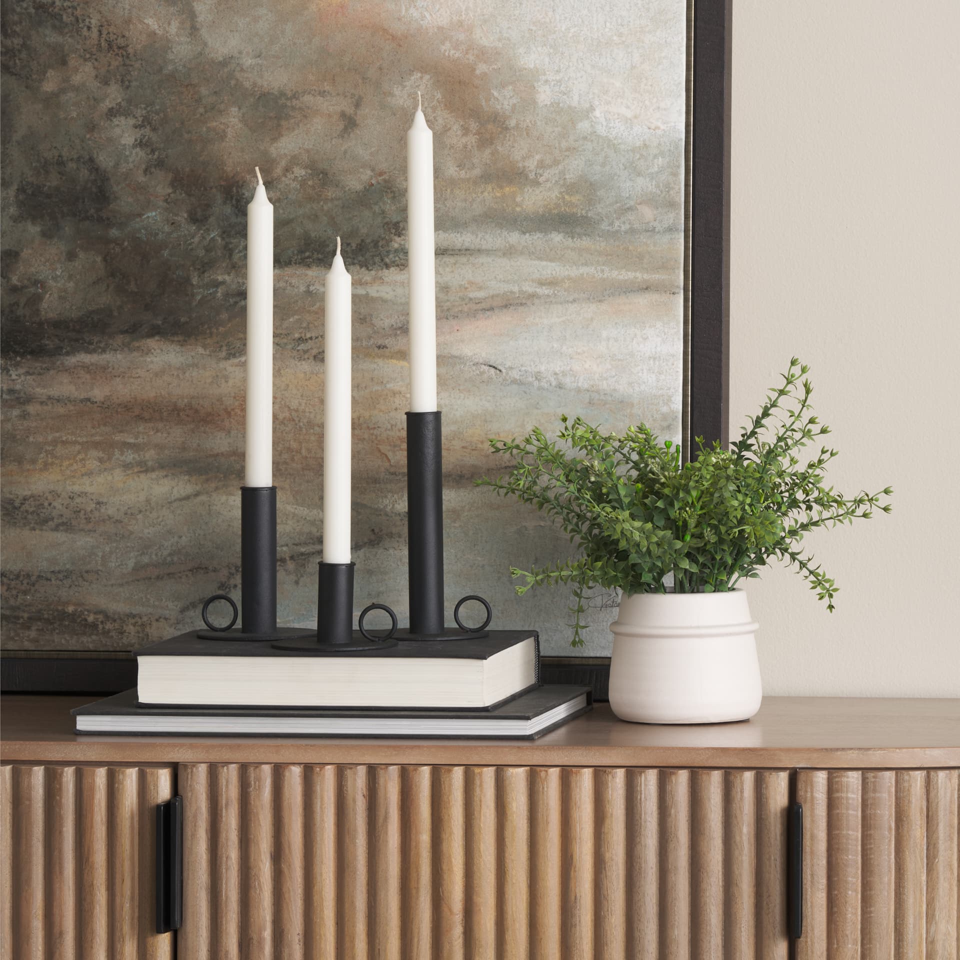 Noir Matte Black Metal Candle Holders (Set of 3) — in a styled room