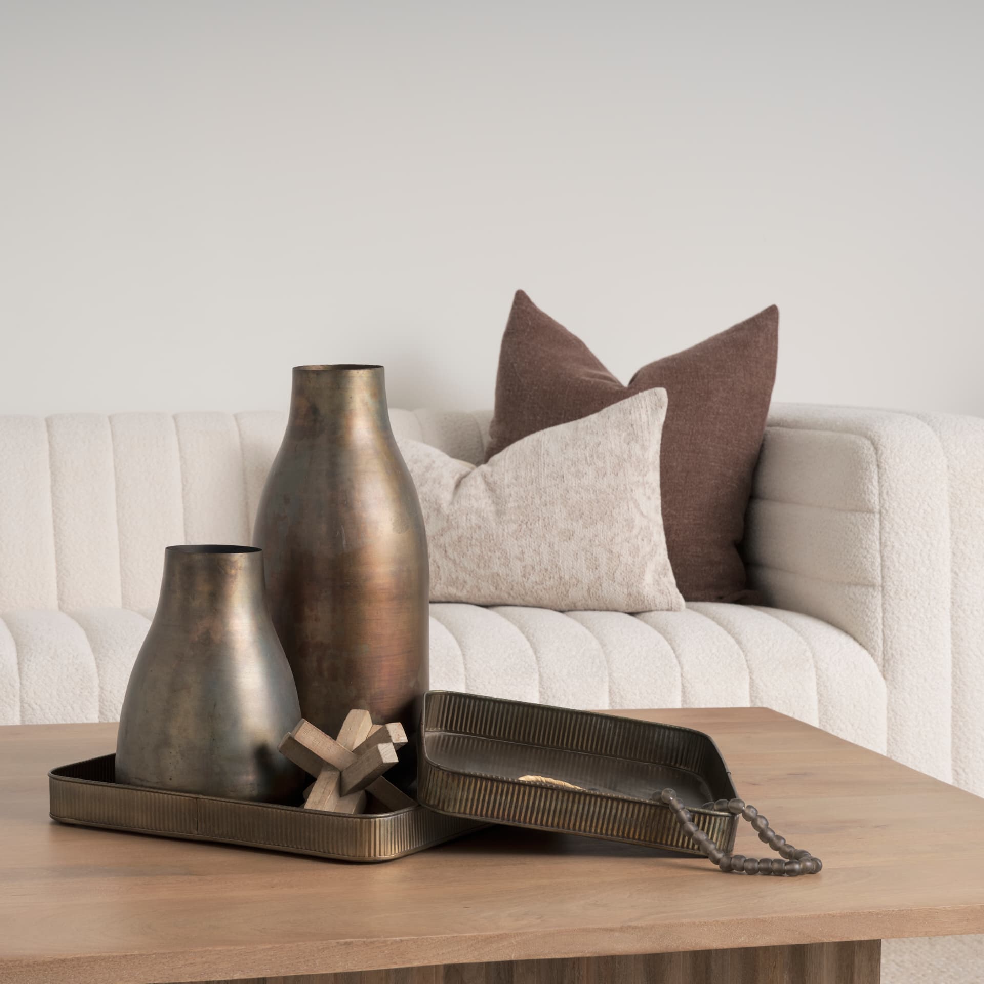 Varun Square Antiqued Brass Metal Tray (Set of 2) — in a styled room
