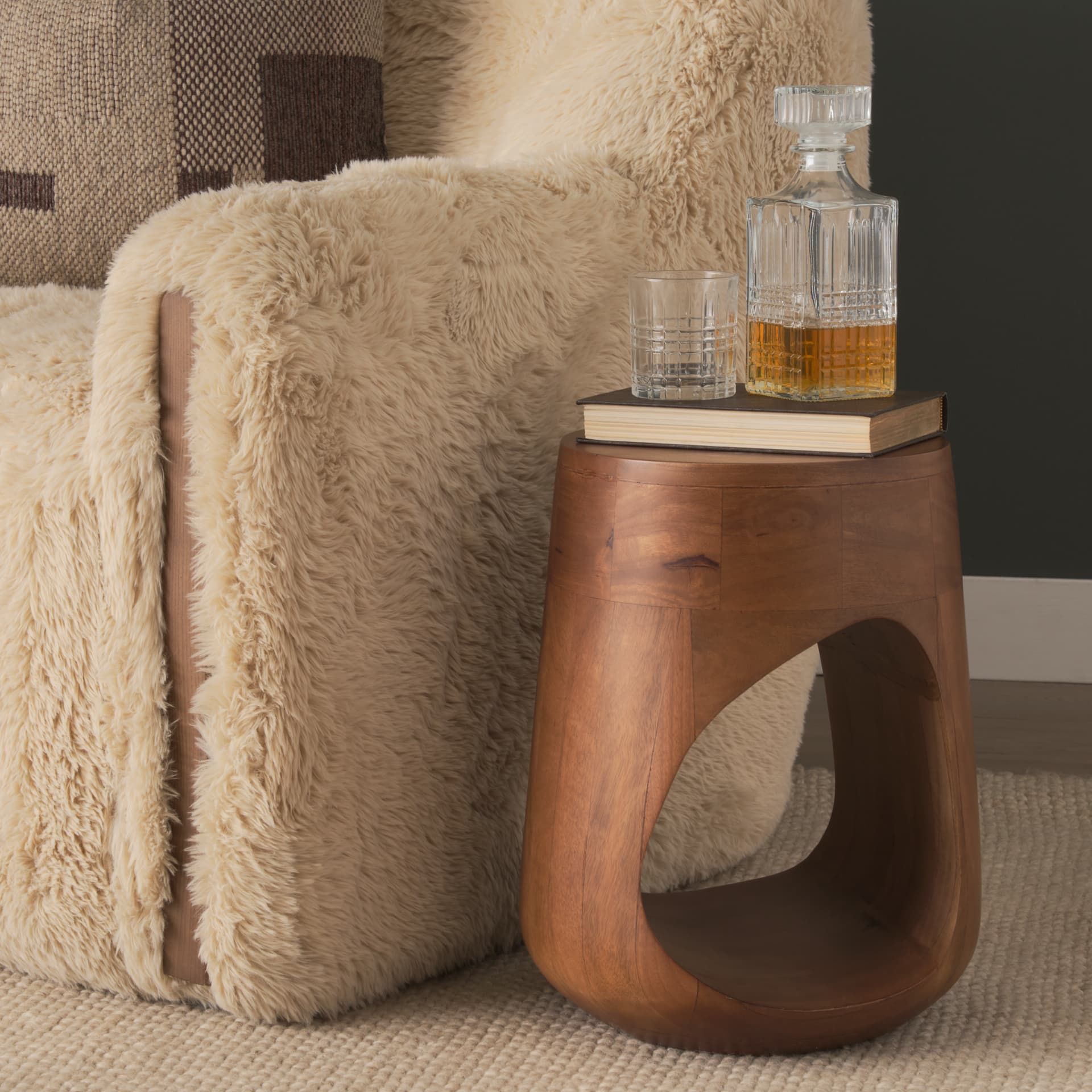 Cove Mid-Brown Sculptural Open Side Table — in a styled room