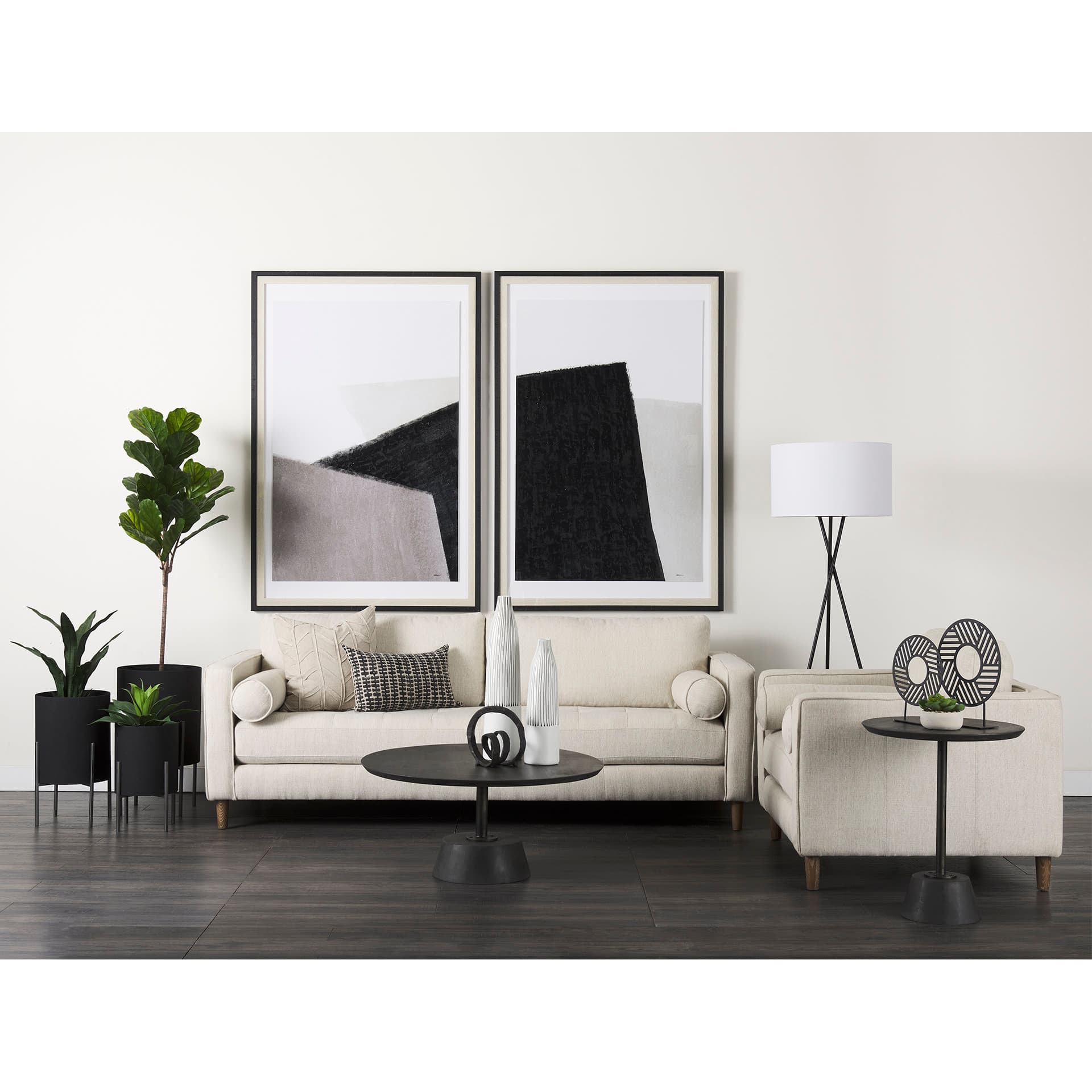 Maxwell 34" Dark Brown Wood W/ Black Metal Pedestal Base Round Coffee Table — in a styled room