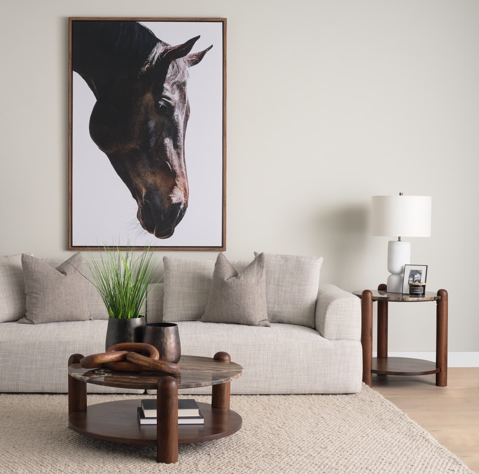 Jovia Brown Mango Wood W/ Cappuccino Marble Round Coffee Table — in a styled room