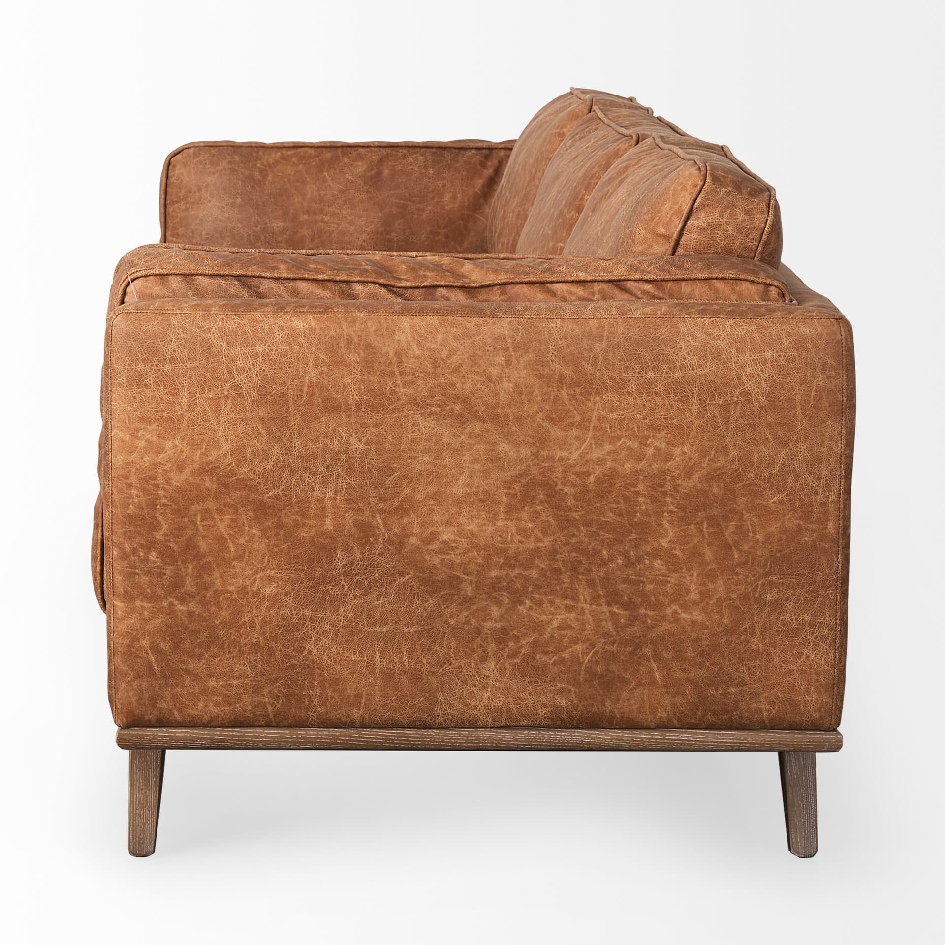 Brooks 90.2L x 34.8W x 33.5H Cognac Brown Faux Leather Three Seater Sofa W/ Medium Brown Wooden Legs — product photograph