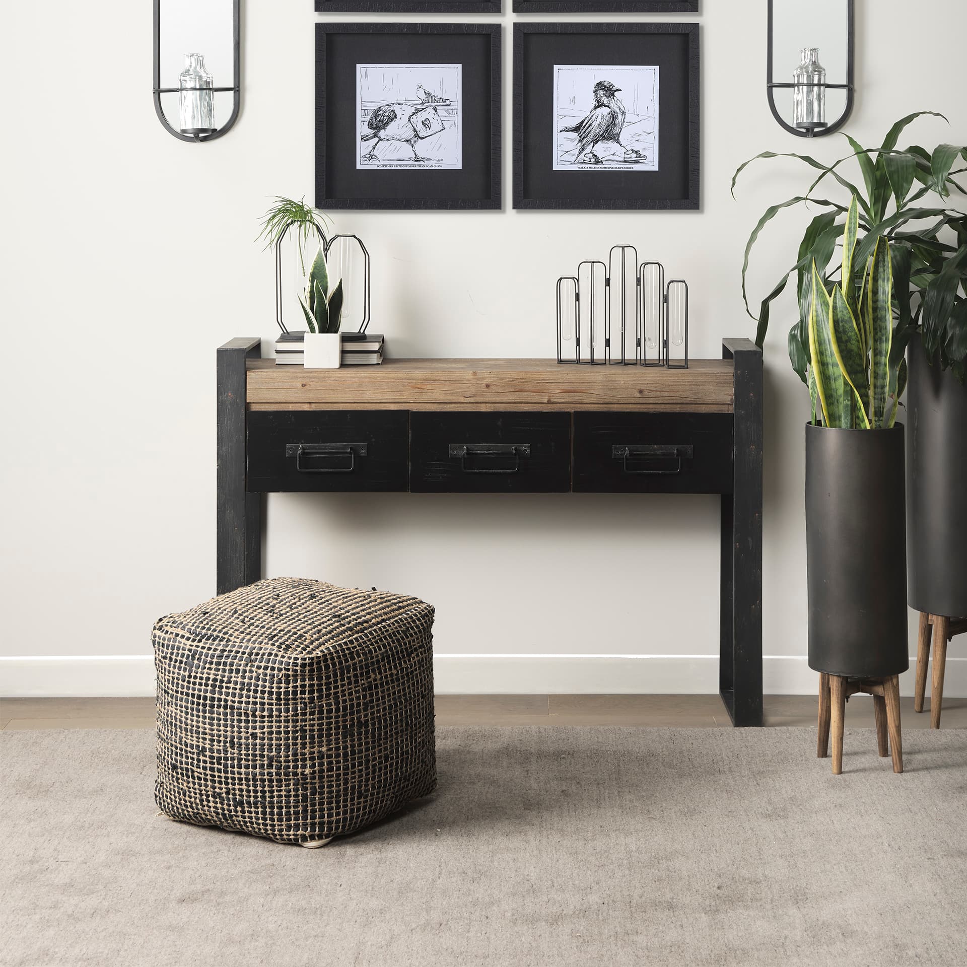 Aalia 16.0L x 16.0W x 16.0H Charcoal Leather and Jute Pouf — in a styled room