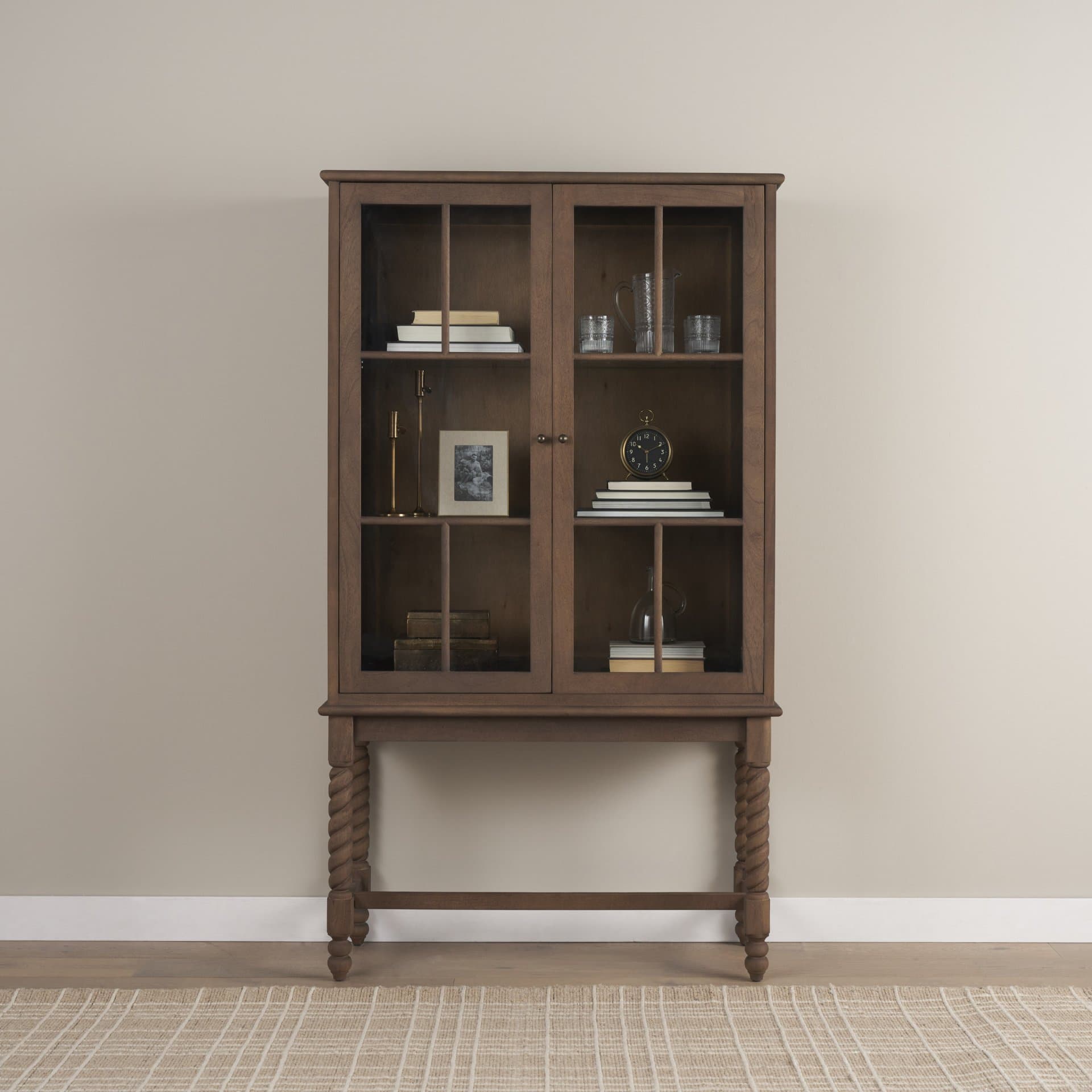 Cromwell Spiral Turned Display Cabinet | Mid-Brown Wood — in a styled room