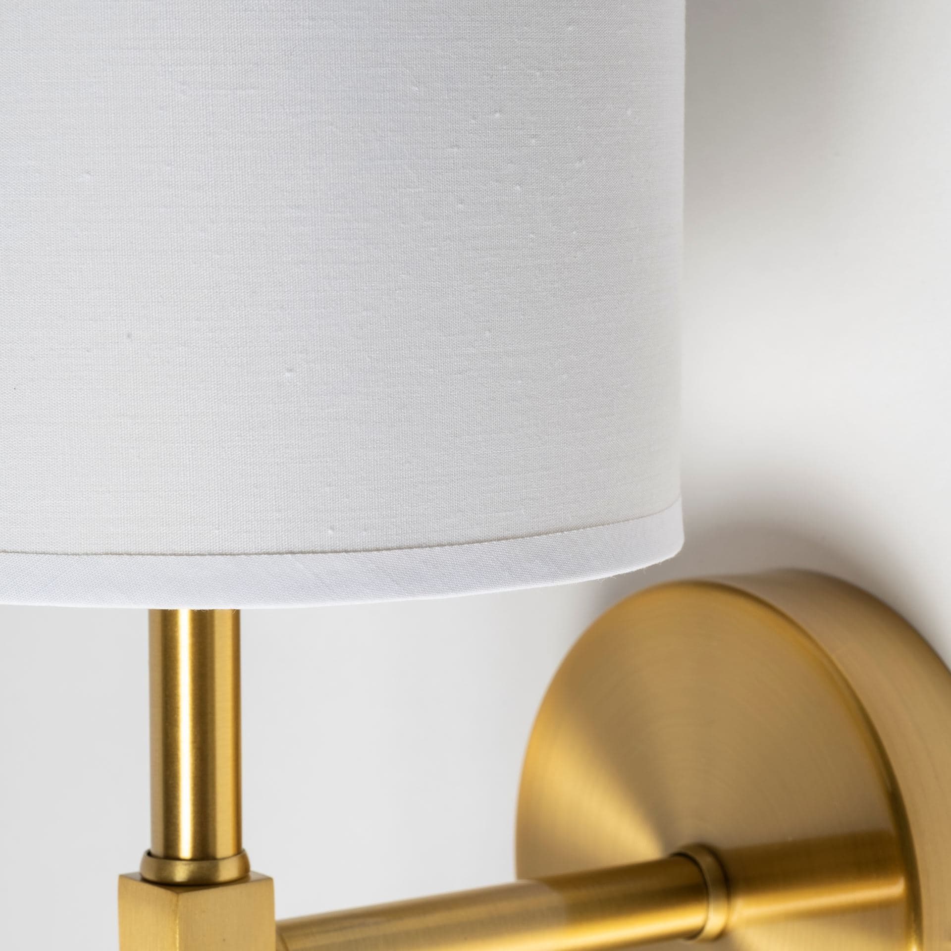 Santander II 6.5x22 Gold Metal and White Linen Shade Wall Sconce — product photograph