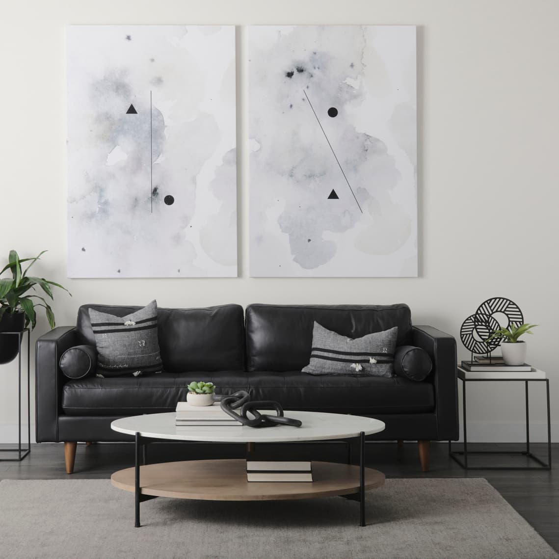 Micra 9.1L x 2.6W x 10.9H Matte Black Metal Decorative Object on a Stand — product photograph