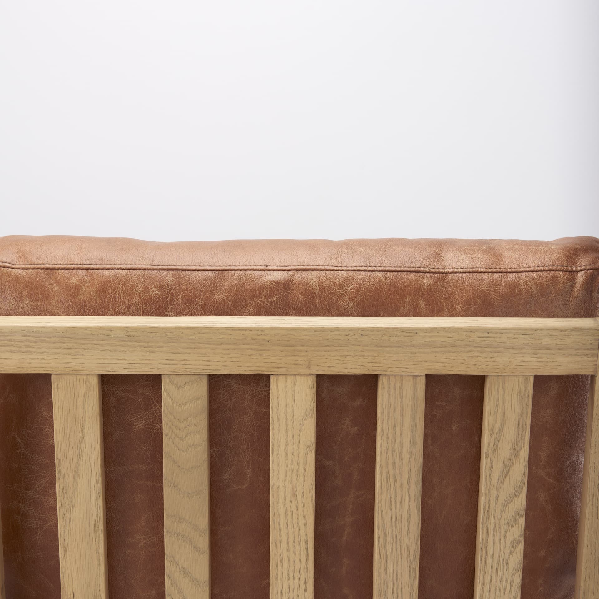 Raeleigh Tan Faux Leather Accent Chair — product photograph