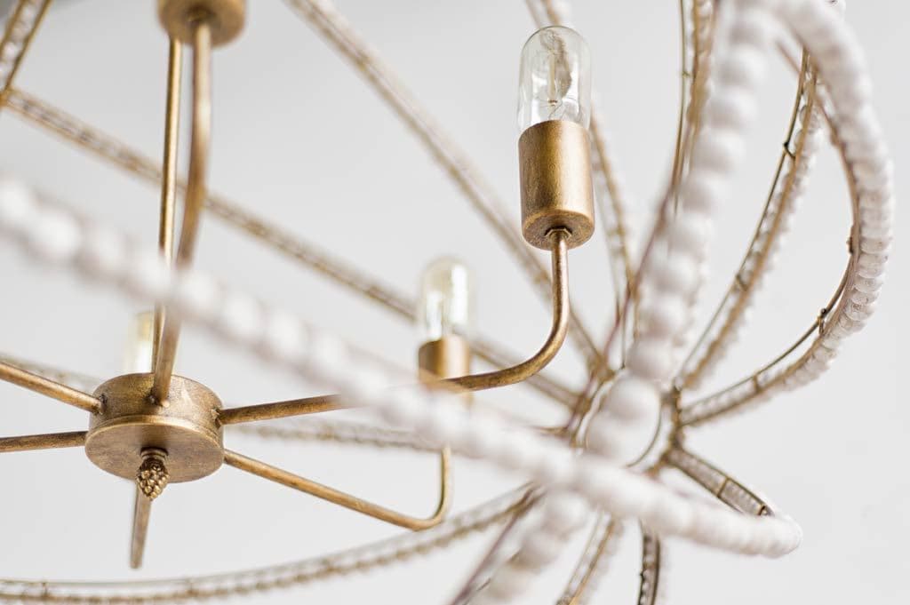 Ava White (34"D) Gold Metal and White Wood Beaded Six Bulb Chandelier — product photograph