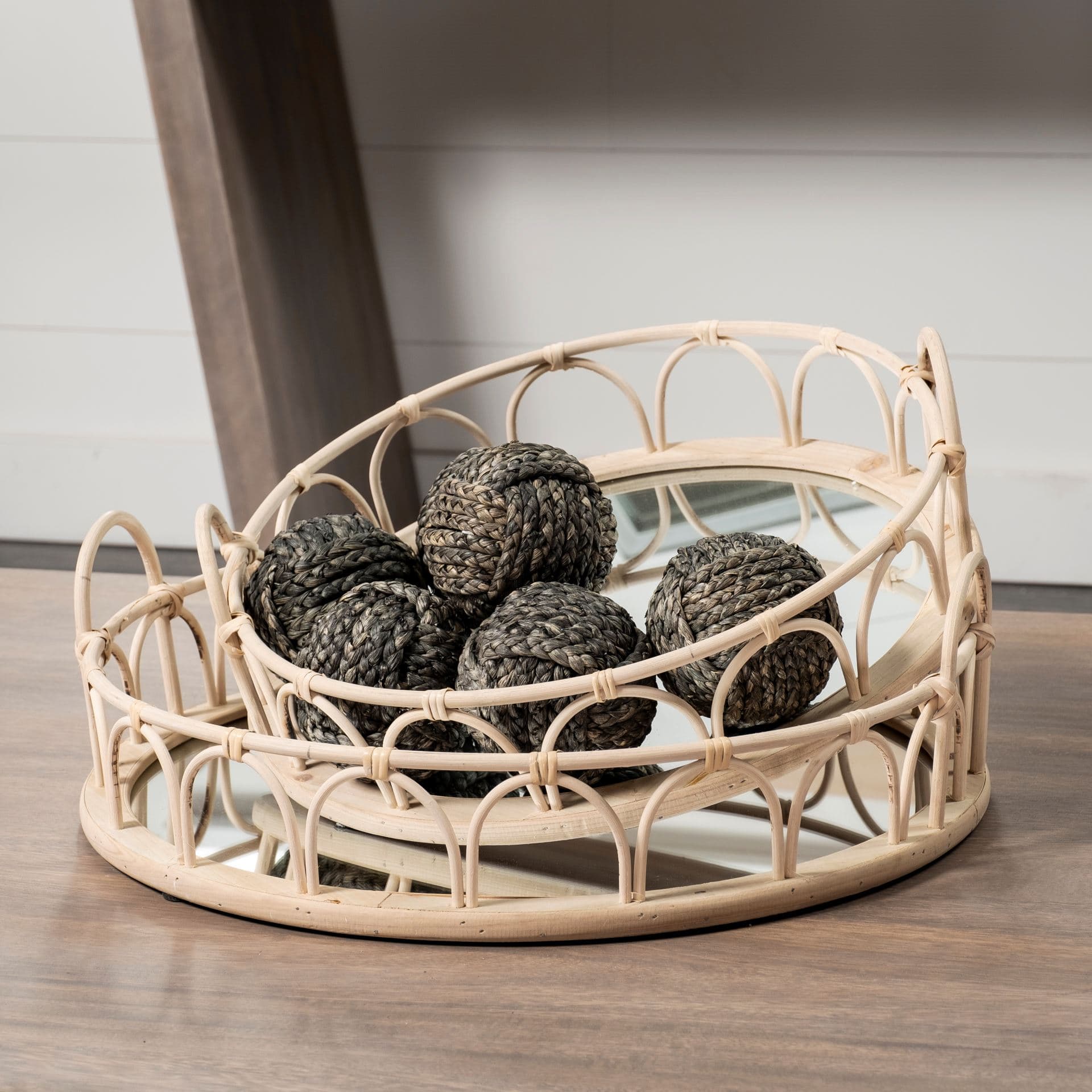 Leona (Set of 2) Natural Wicker Woven Mirrored Base Nesting Trays — in a styled room