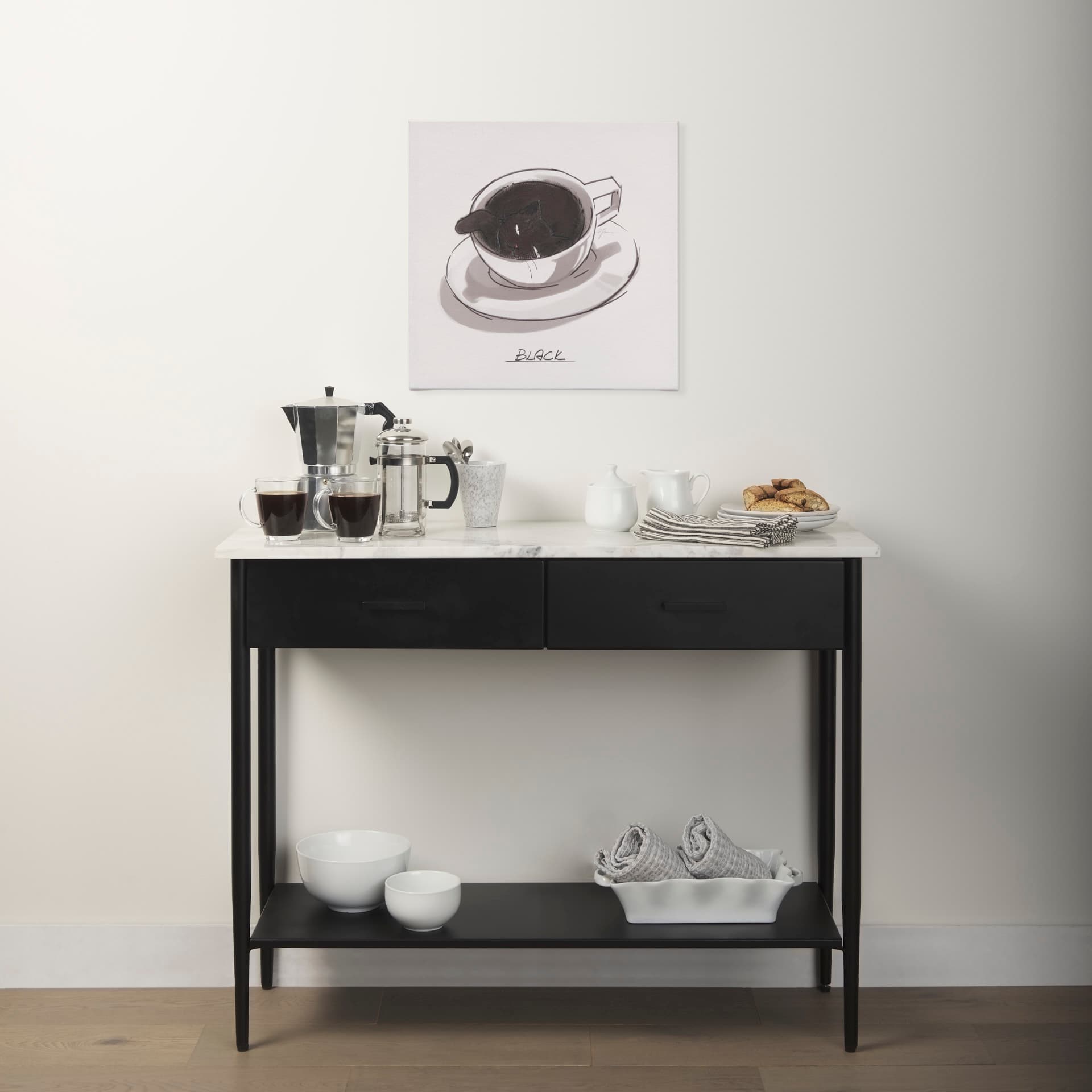 Amika White Marble Top Black Metal Base Console Table — in a styled room