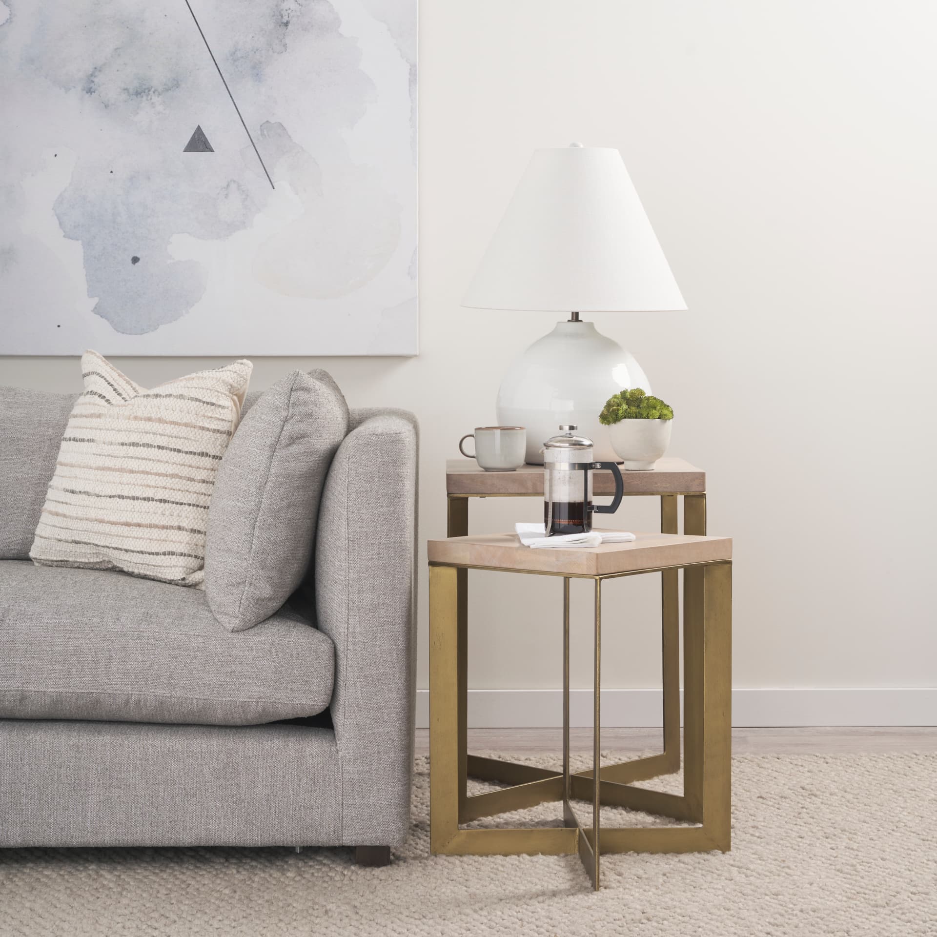 Faye (Set of 2) 19L x 19W x 26H Beige Finished Wood W/ Gold Metal Base Accent Tables — in a styled room