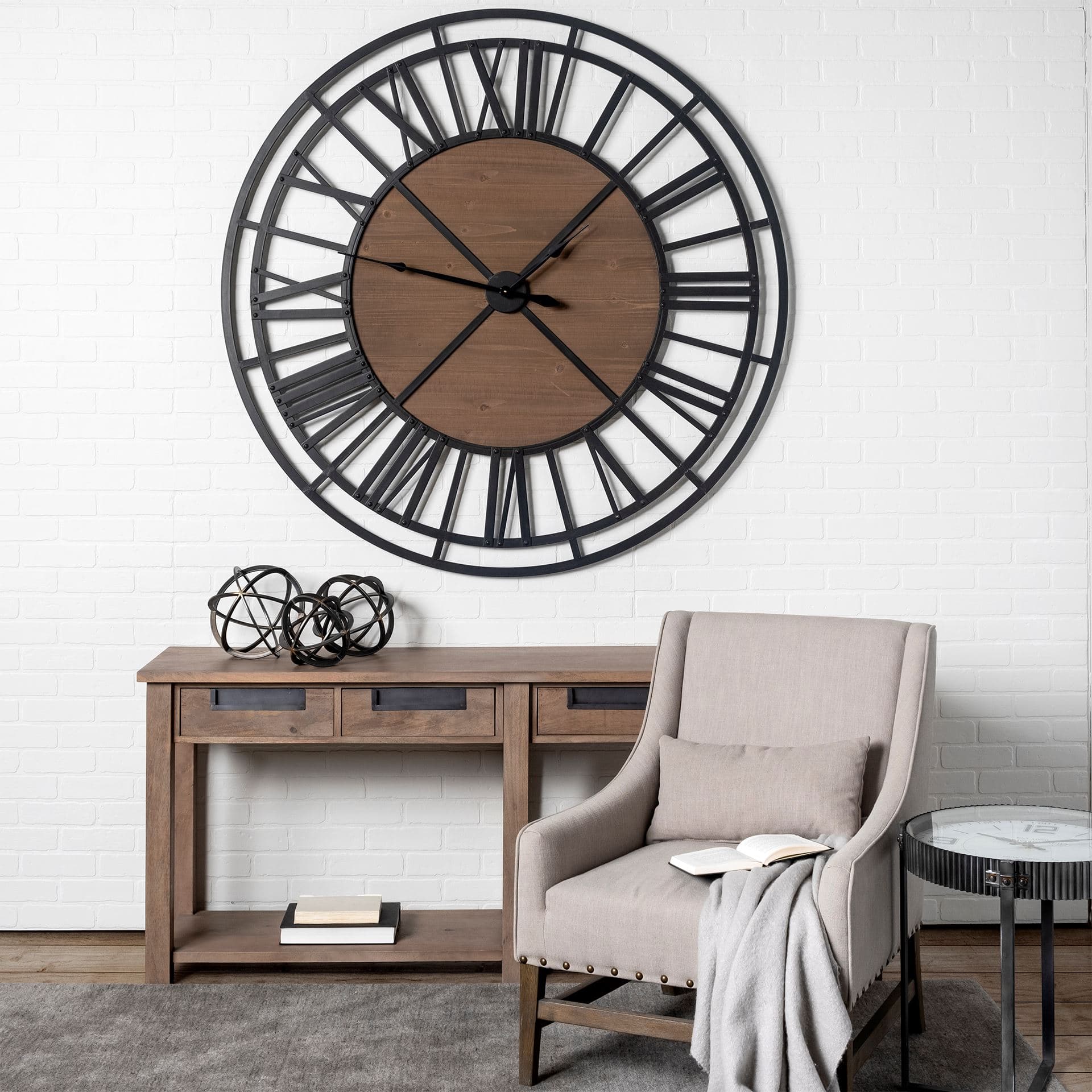Galenna I (Small) 8L x 8W Black Metal Circular Decorative Orb — in a styled room