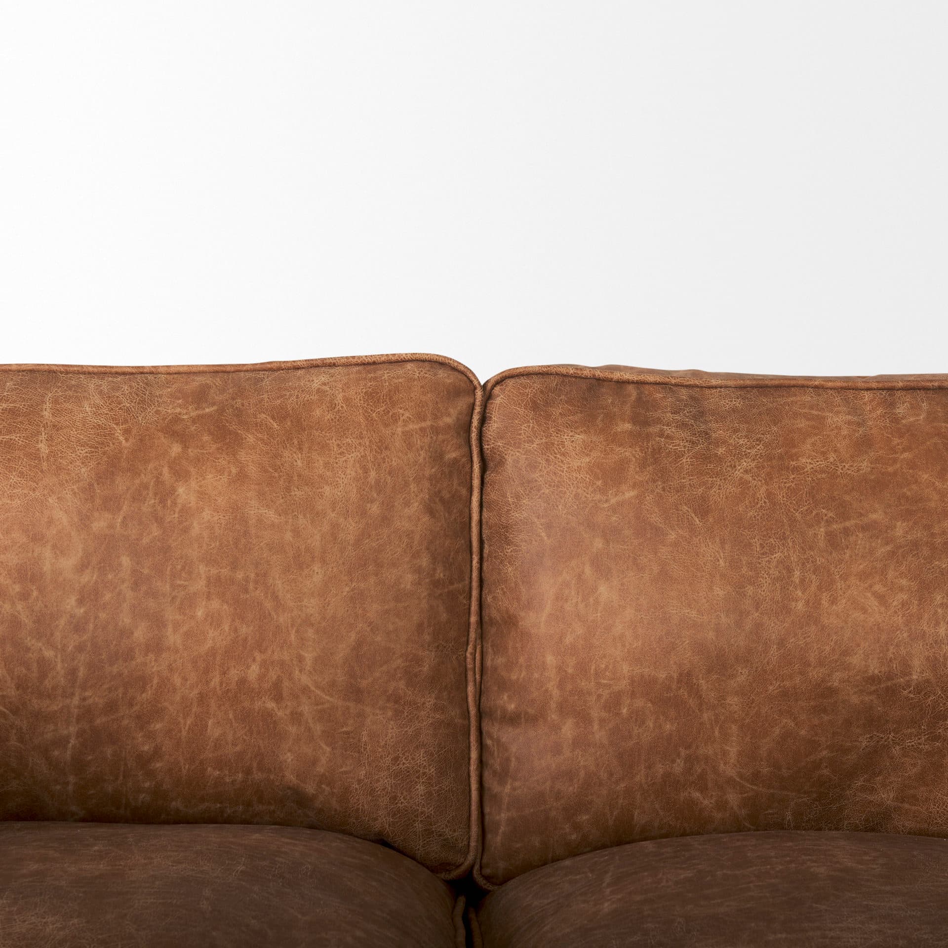 Brooks 90.2L x 34.8W x 33.5H Cognac Brown Faux Leather Three Seater Sofa W/ Medium Brown Wooden Legs — product photograph
