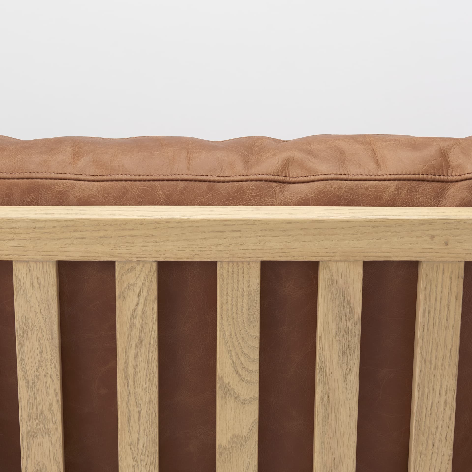 Raeleigh 28.0L x 34.1W x 34.4H Cognac Leather W/ Light Brown Wood Frame Accent Chair — product photograph