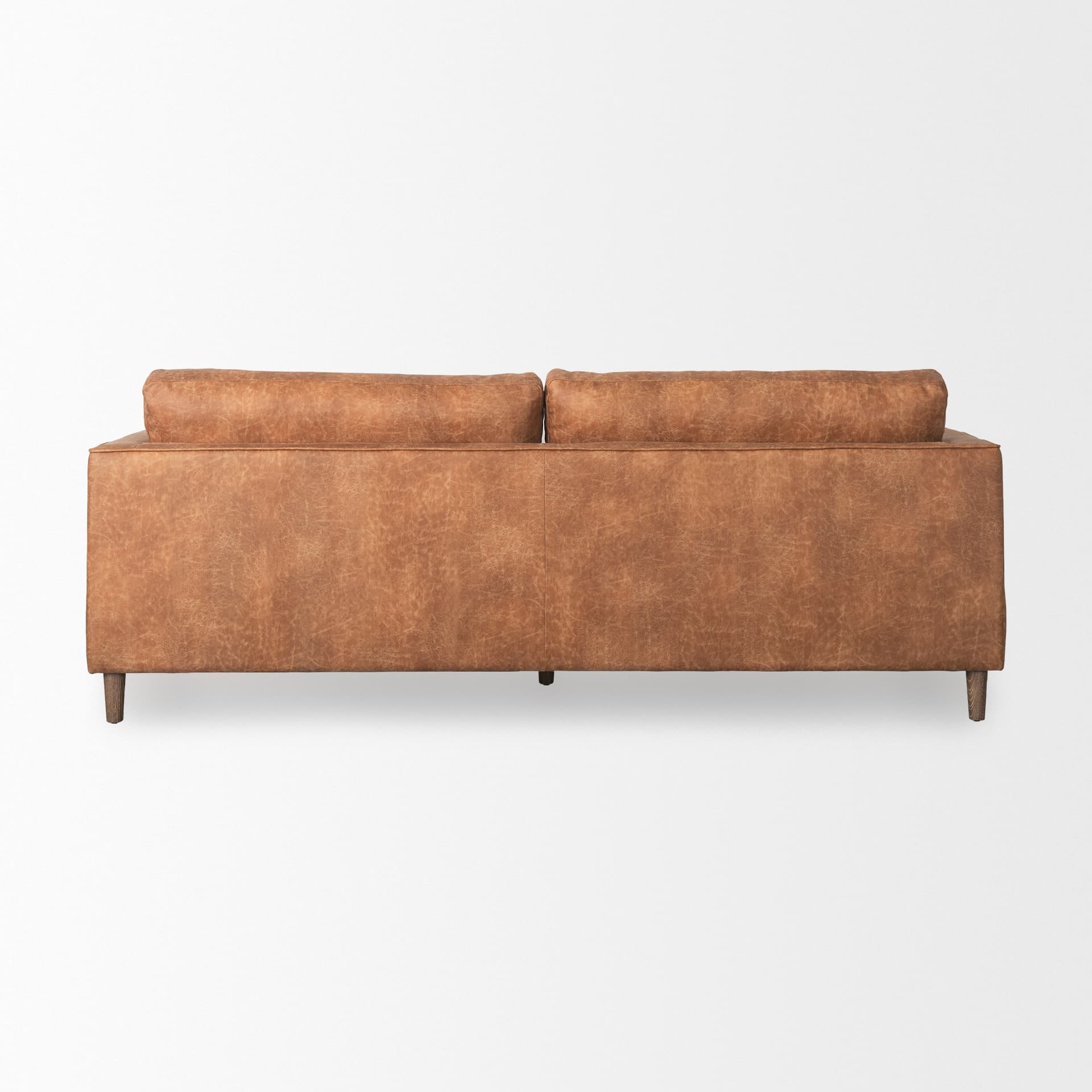 Loretta 88.0L x 36.2W x 33.9H Cognac Brown Faux Leather Three Seater Sofa with Two Bolster Cushions — product photograph