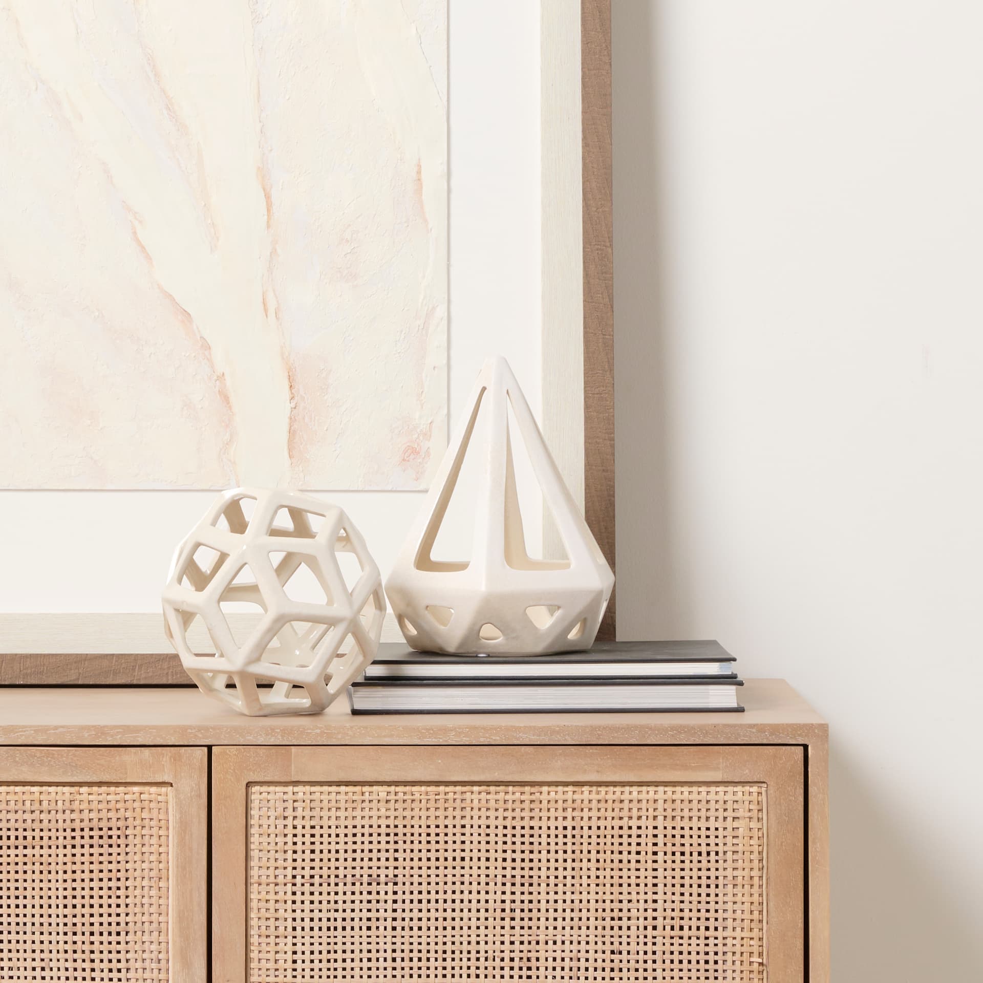 Hood 7.7L x 7.7W x 9.4H White Geometric Ceramic Object — in a styled room