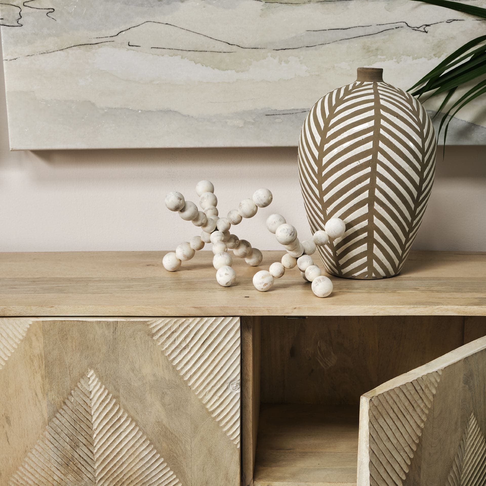 Carrollton I (Small) 7L x 7W Off-White Geometric Wood Ball Jack — in a styled room