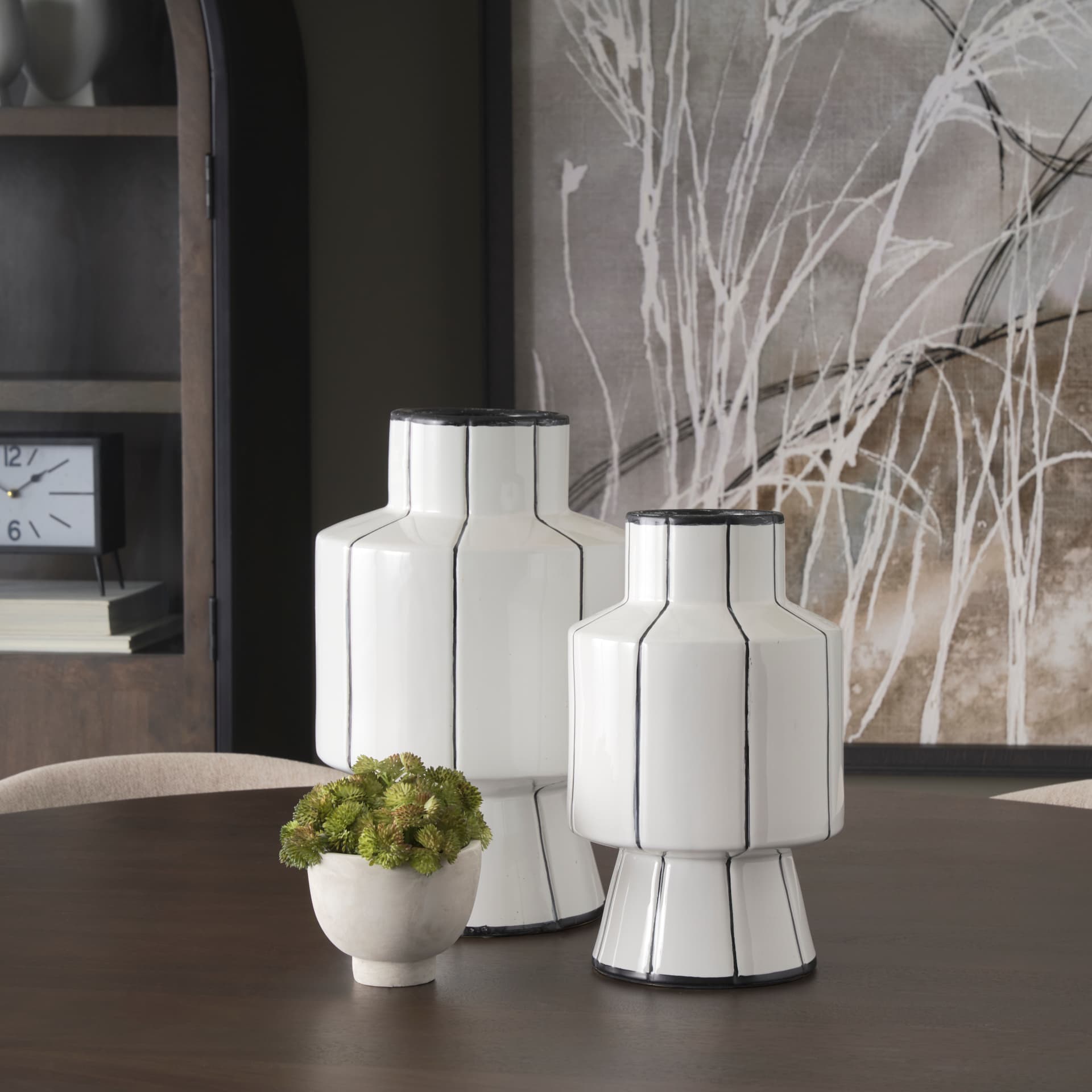 Dinah Small White w/ Black Stripes Ceramic Vase — in a styled room