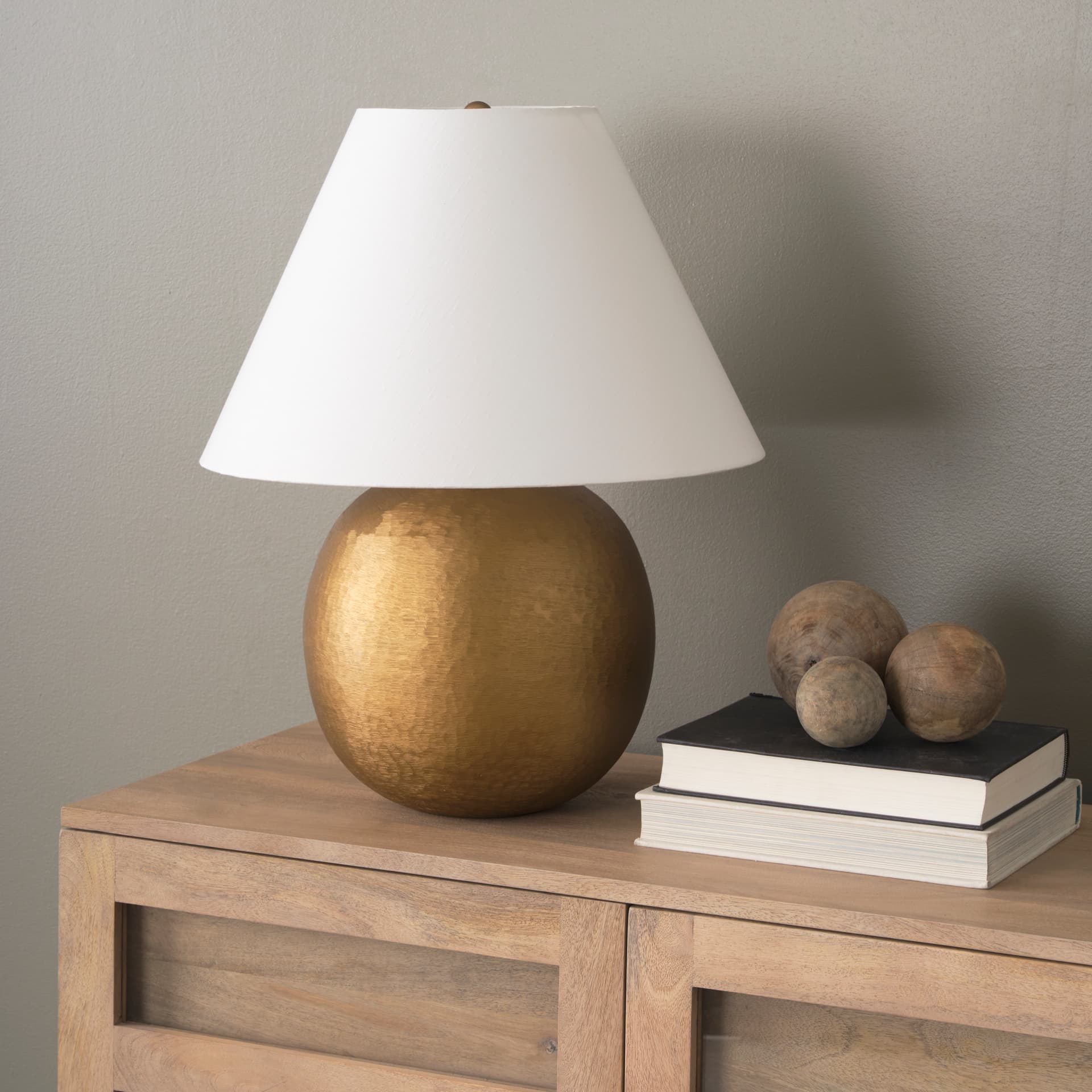 Sadiyah Antiqued Gold Brushed Metal w/ Cream Shade Table Lamp — product photograph
