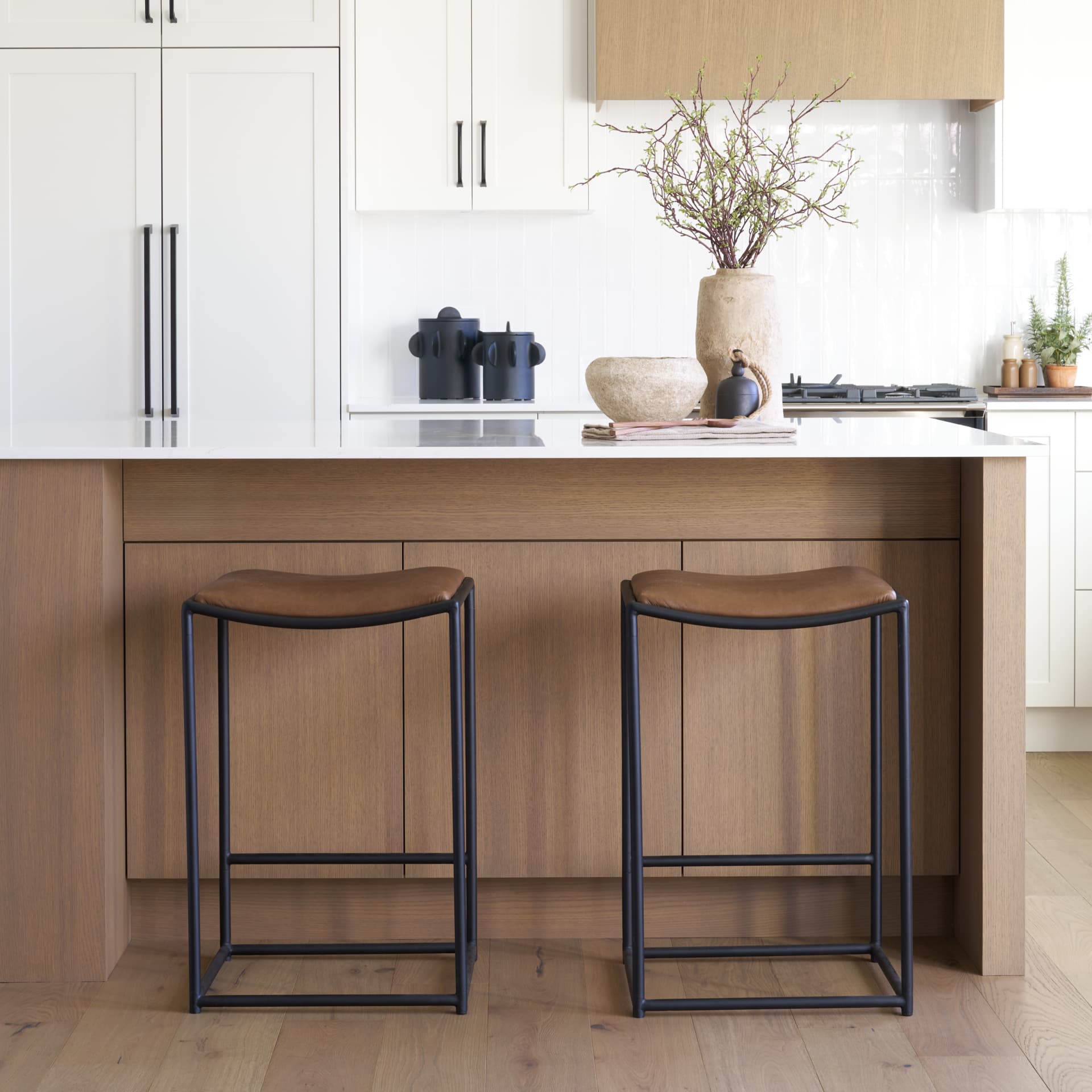 Taniel Backless 27.25in Seat Counter Stool | Brown Leather w/ Metal — product photograph