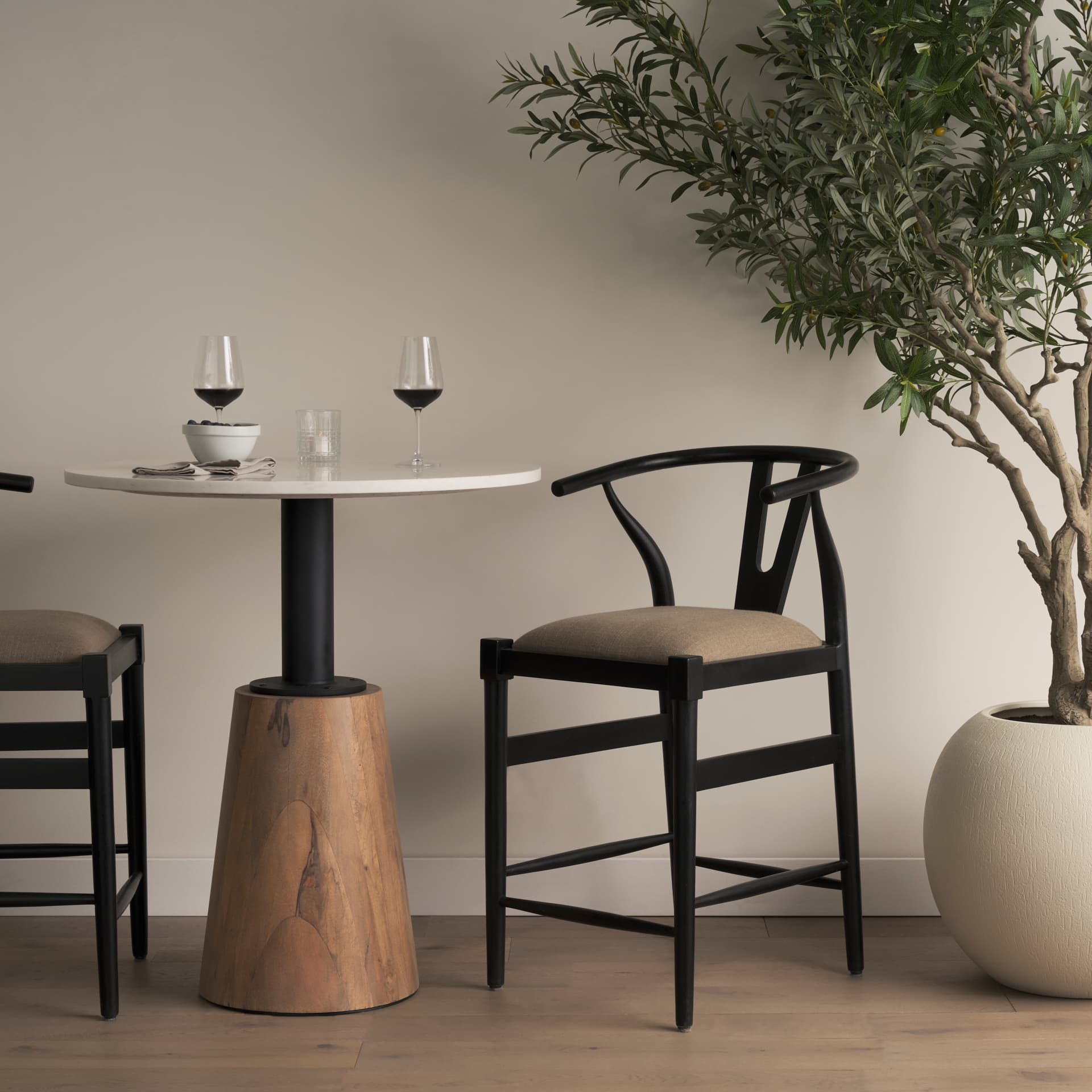 Trixie Backless 37.5in Seat Counter Stool | Beige Fabric w/ Black Wood — product photograph
