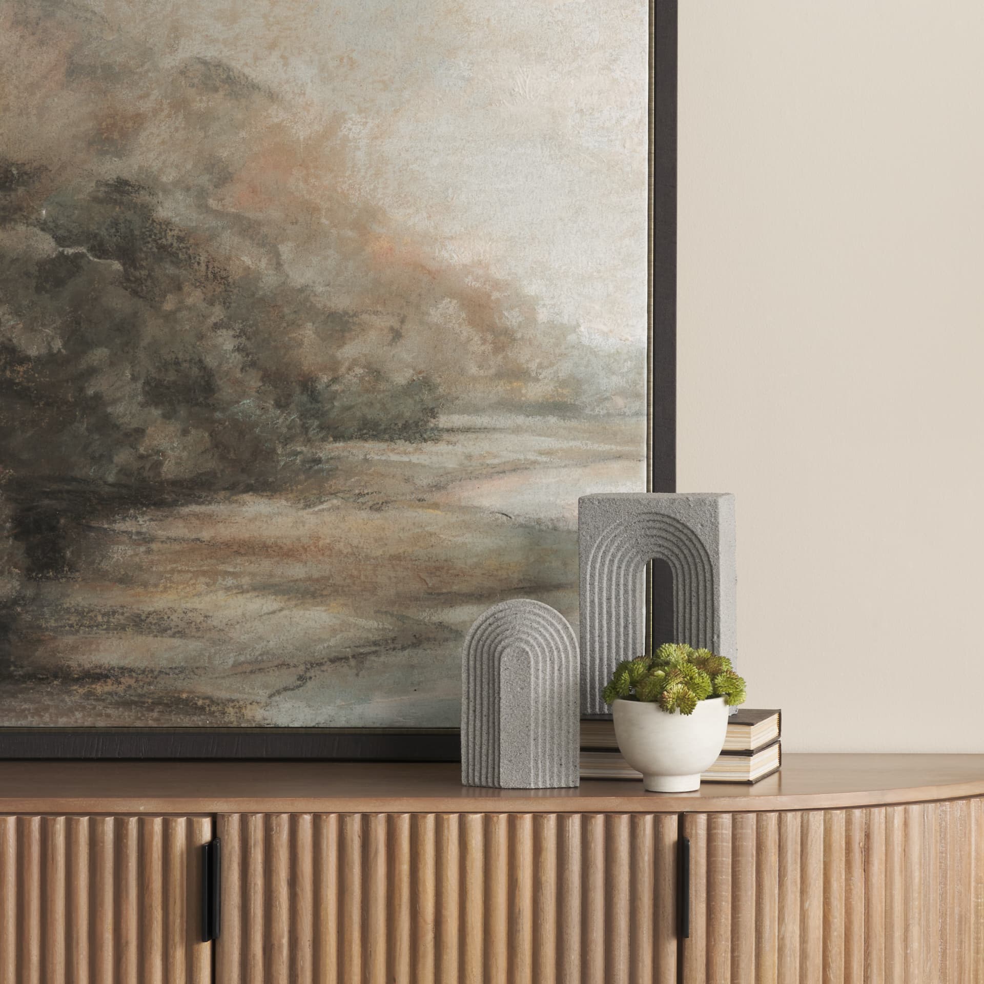 Kacia Resin Textured Concrete Gray Decorative Object — in a styled room