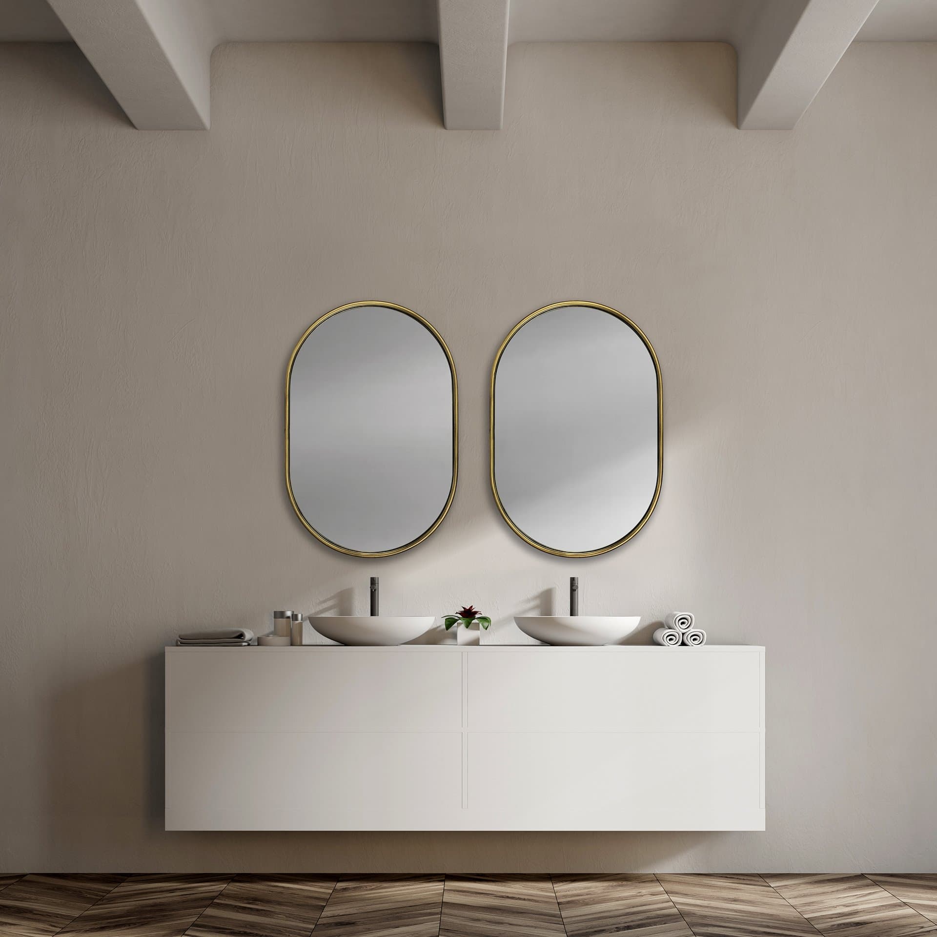 Sylvia I 24L x 35H Oval Gold Metal Frame Wall Mirror — in a styled room